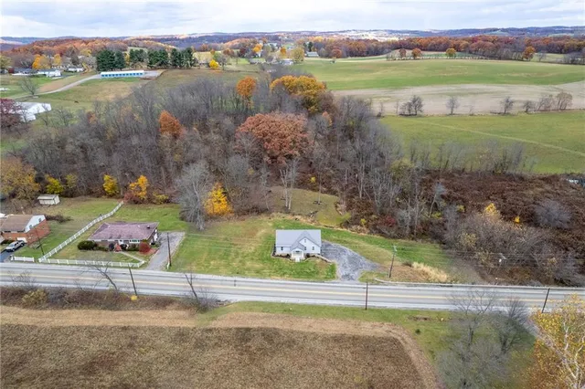 a view of swimming pool with a yard