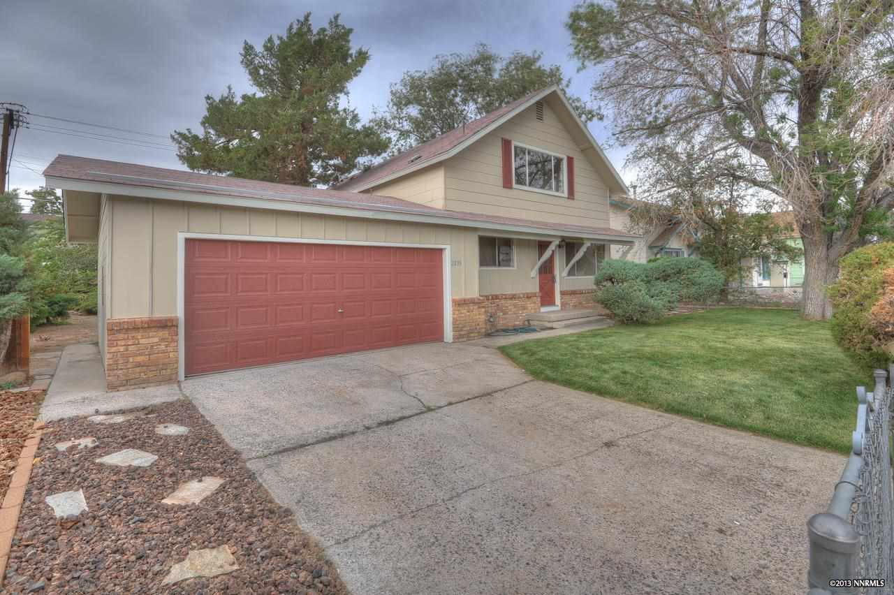 2235 Mannington Street Reno, NV 89512 - Photo 1 of 1 a front view of house with yard and trees