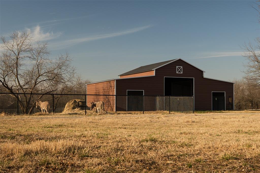 5165 Hartlee Field Road Denton, TX 76208 - Photo 23 of 39 a front view of a house with a yard