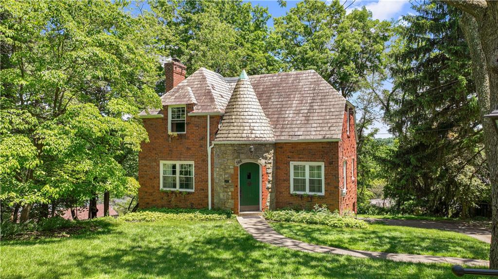 569 Kenilworth Drive Pittsburgh, PA 15228 - Photo 1 of 29 front view of a house with a yard