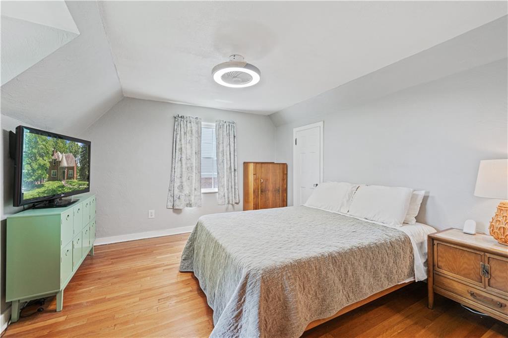 569 Kenilworth Drive Pittsburgh, PA 15228 - Photo 20 of 29 a bedroom with a bed and a flat screen tv