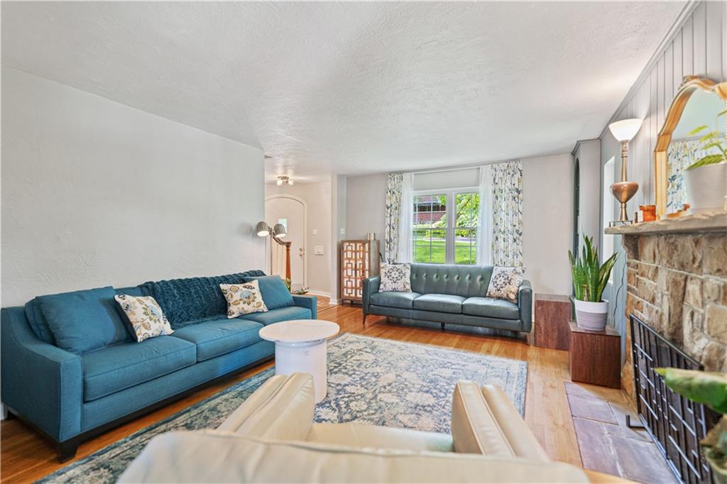 569 Kenilworth Drive Pittsburgh, PA 15228 - Photo 6 of 29 a living room with furniture and a large window