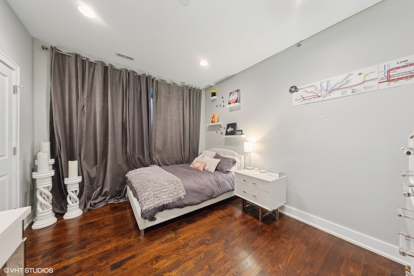 2548 West Irving Park Road, Unit 1E Chicago, IL 60618 - Photo 14 of 17 a bedroom with a bed and a window