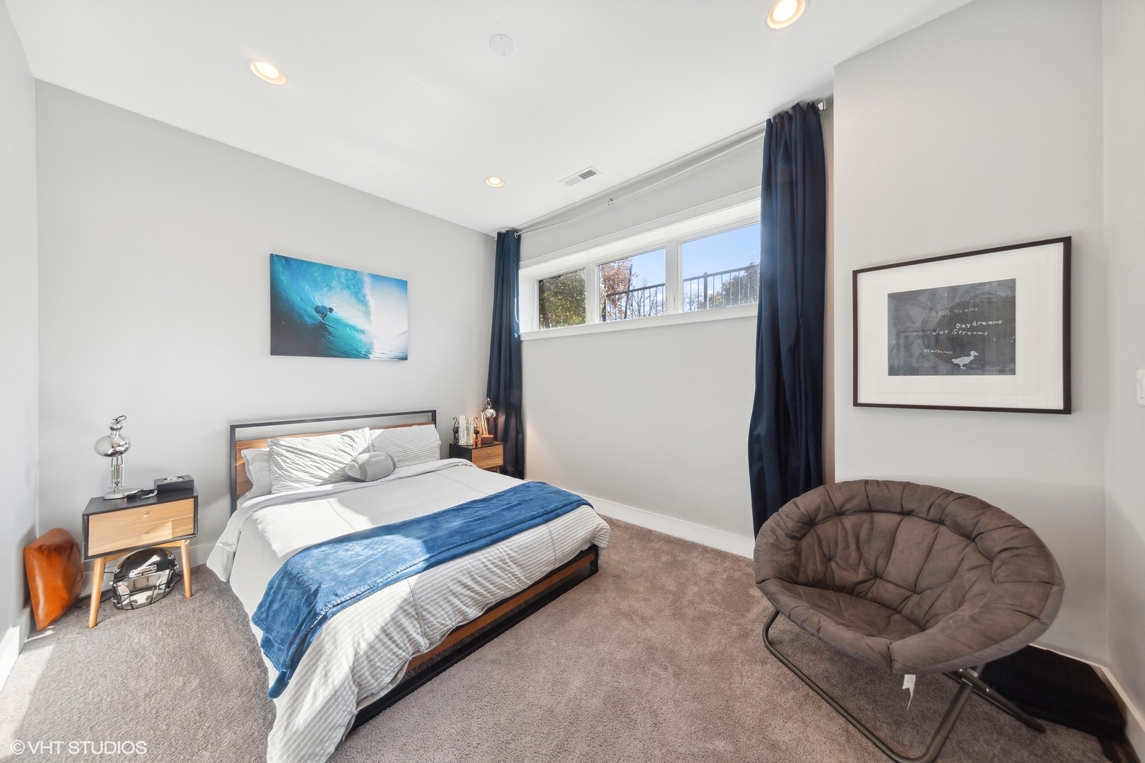 2548 West Irving Park Road, Unit 1E Chicago, IL 60618 - Photo 16 of 17 a bedroom with a bed and furniture