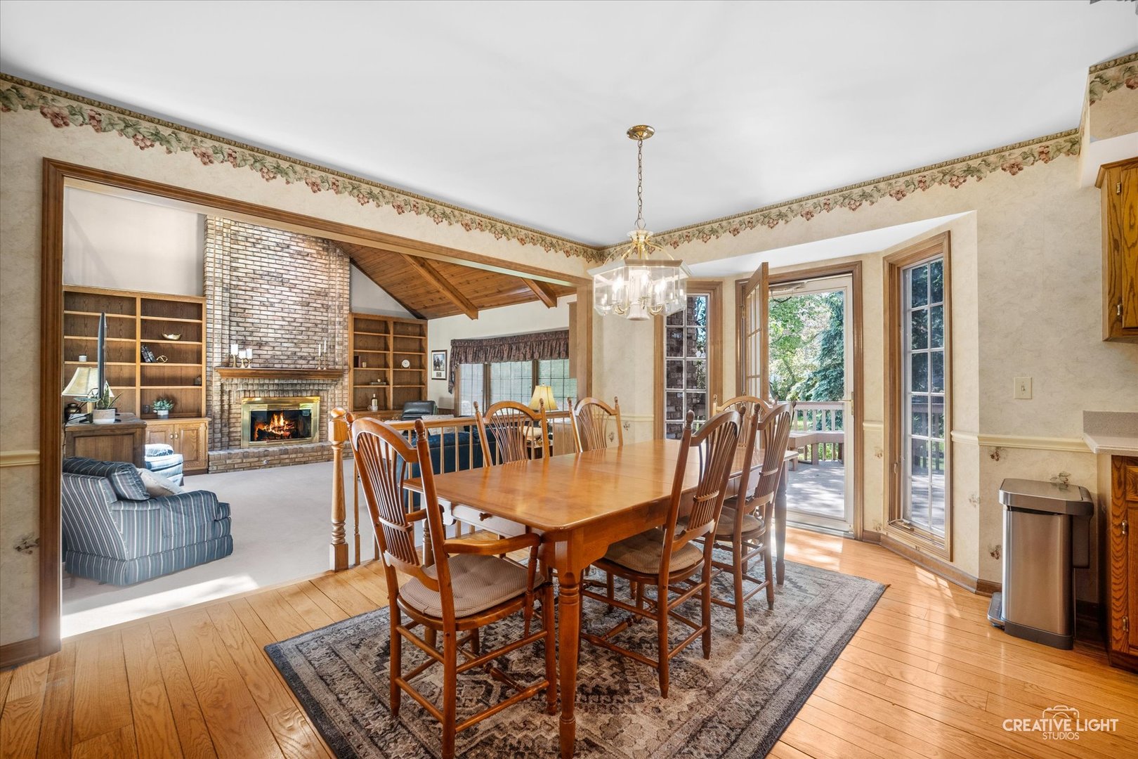 3112 Turnberry Road St. Charles, IL 60174 - Photo 12 of 43 a dining room with furniture window and wooden floor