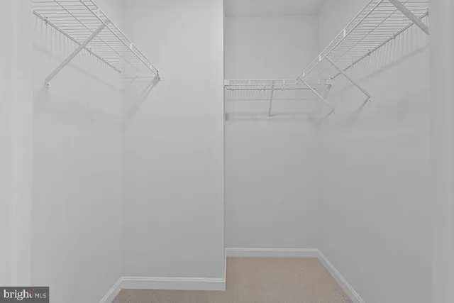 a view of small space with racks on the wall