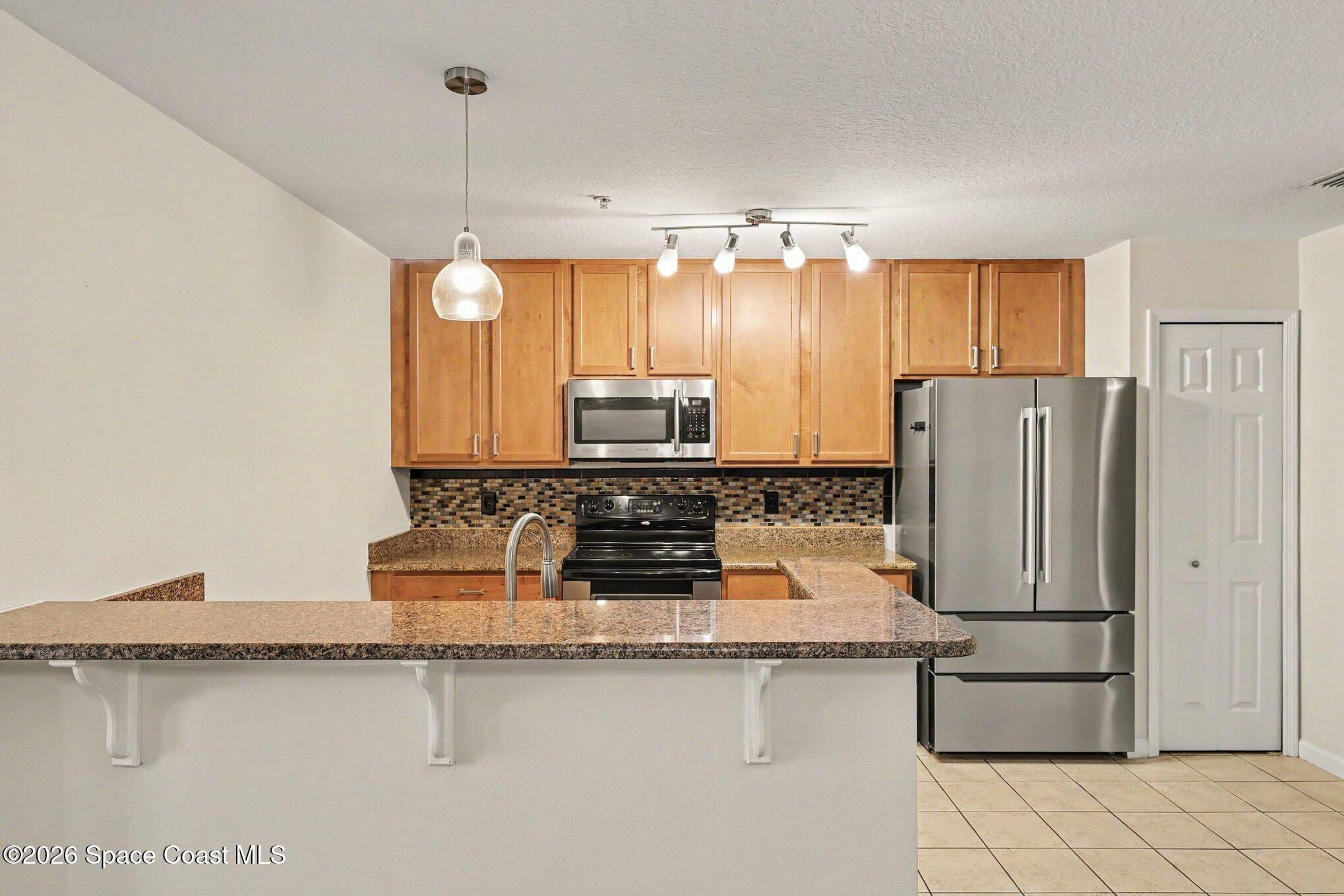 4066 Meander Place, Unit 203 Rockledge, FL 32955 - Photo 3 of 31 Kitchen