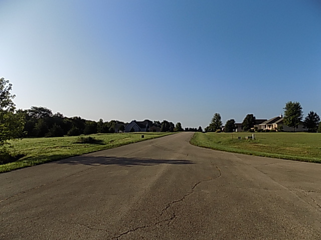 3621 East 1759th Road Ottawa, IL 61350 - Photo 3 of 5 a view of road and bench