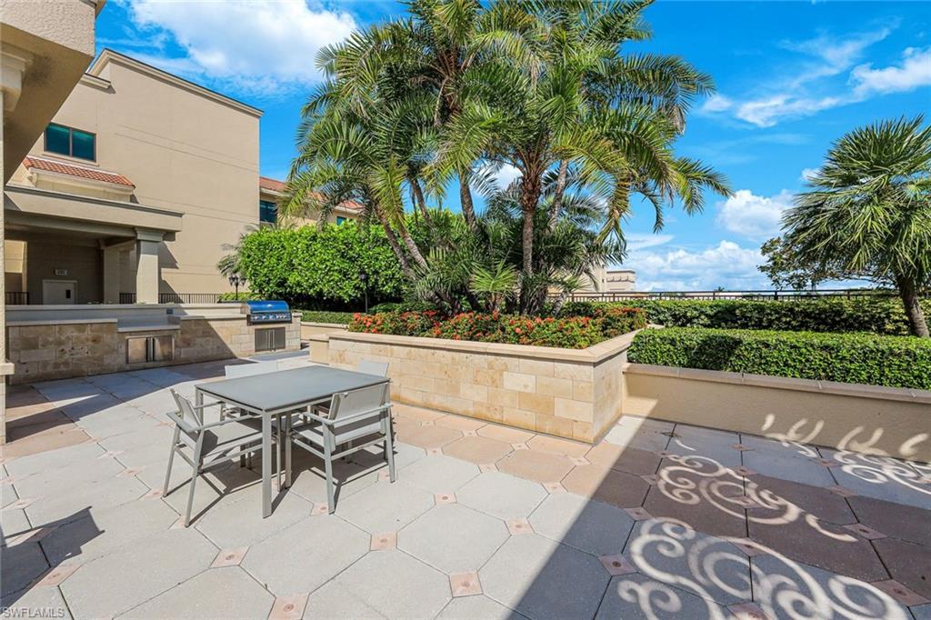 9123 Strada Place, Unit 7201 Naples, FL 34108 - Photo 31 of 50 a view of house with outdoor space and seating area