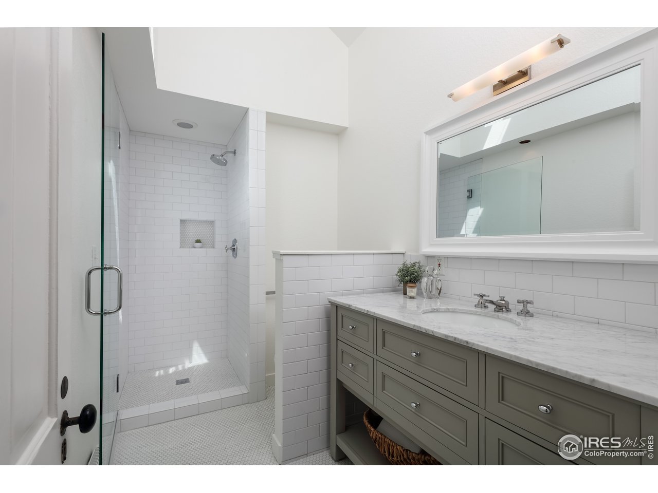 5629 Prospect Road Niwot, CO 80503 - Photo 15 of 40 a bathroom with a granite countertop sink mirror and double