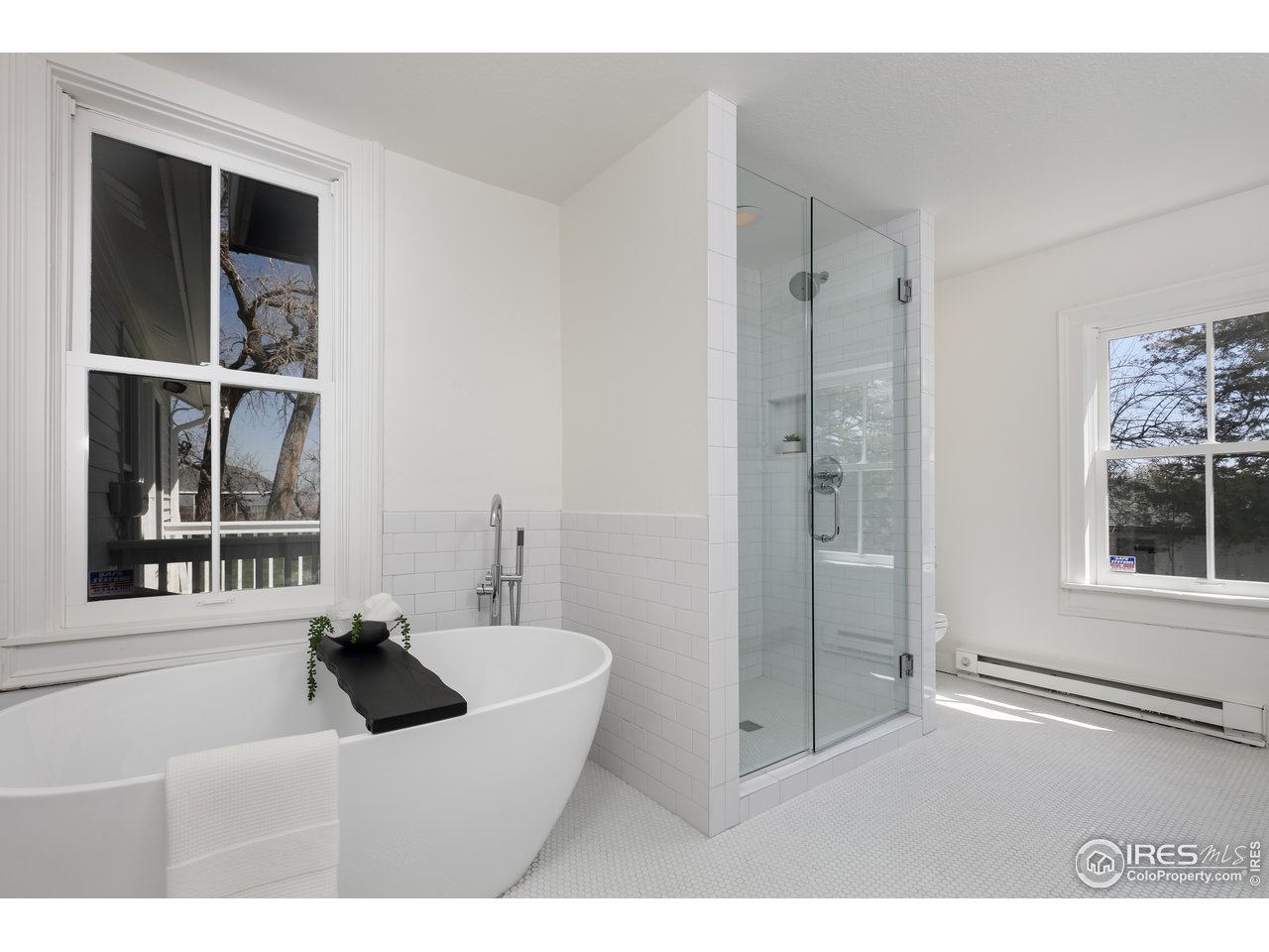 5629 Prospect Road Niwot, CO 80503 - Photo 21 of 40 a bathroom with a sink and a mirror