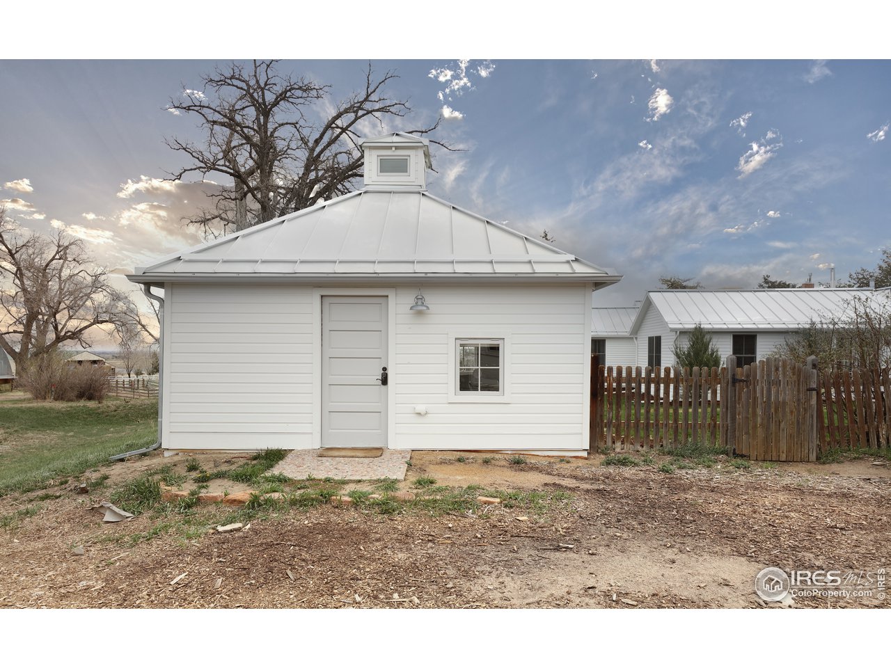 5629 Prospect Road Niwot, CO 80503 - Photo 28 of 40 a front view of a house with a yard