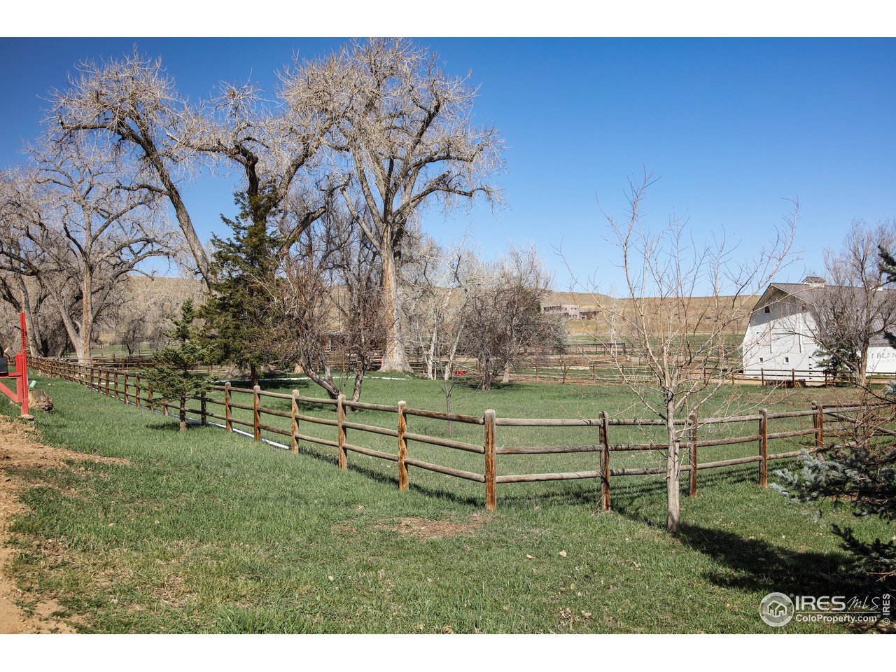 5629 Prospect Road Niwot, CO 80503 - Photo 30 of 40 a view of a bench in a yard