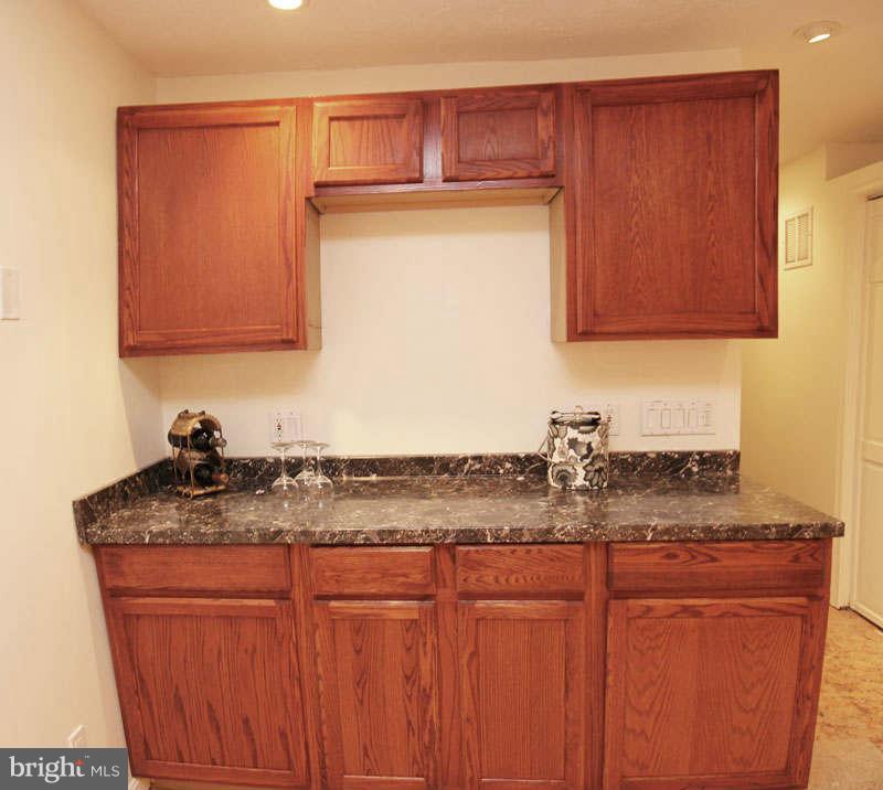 7945 Lobelia Lane Springfield, VA 22152 - Photo 14 of 17 bar in basement