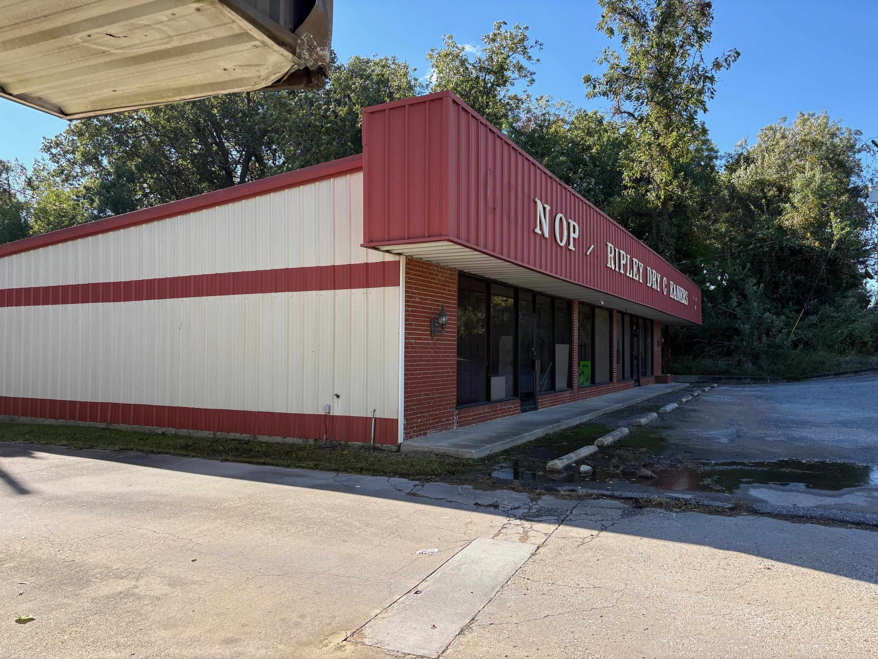 334 Washington Street Ripley, TN 38063 - Photo 5 of 12 a view of a house with a yard