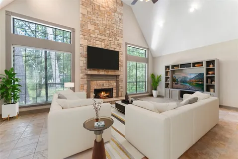 a large kitchen with a table and chairs