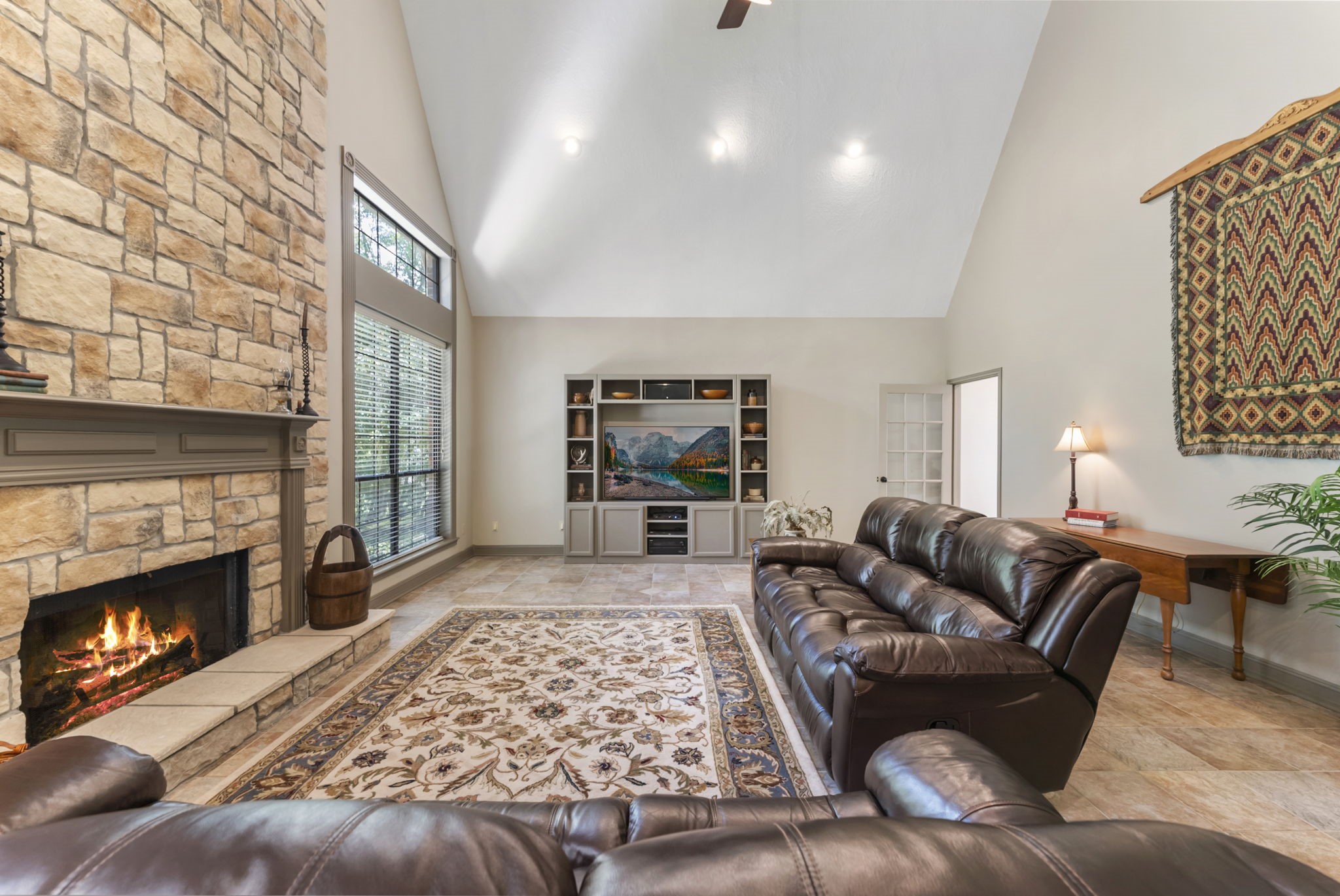 24311 Standing Oak Drive Spring, TX 77389 - Photo 13 of 41 a living room with furniture and a fireplace
