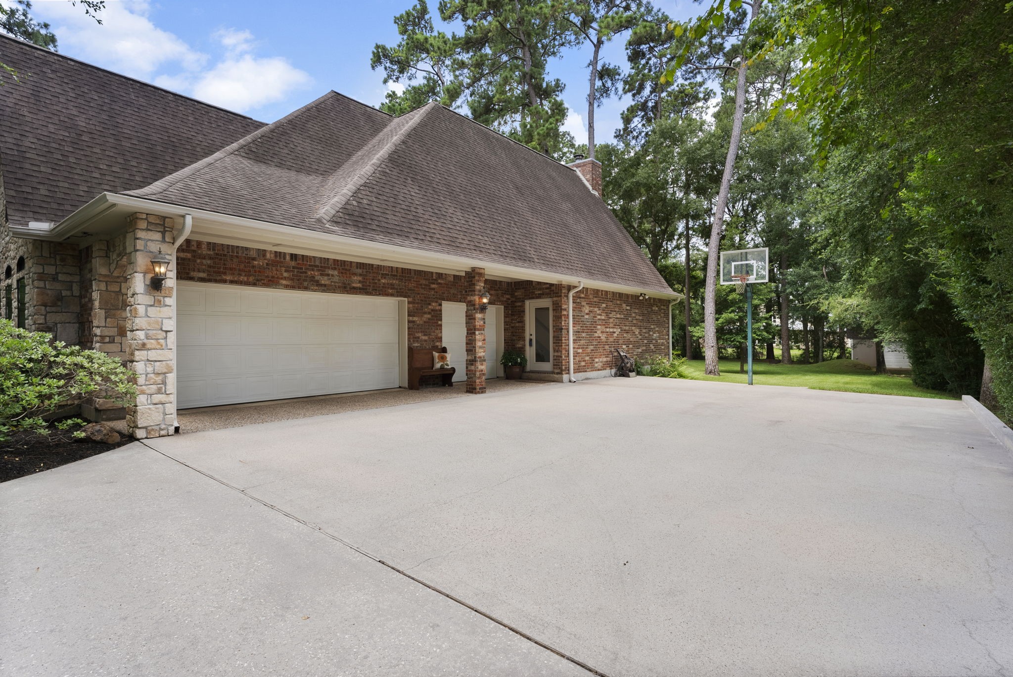 24311 Standing Oak Drive Spring, TX 77389 - Photo 34 of 41 a house view with a outdoor space