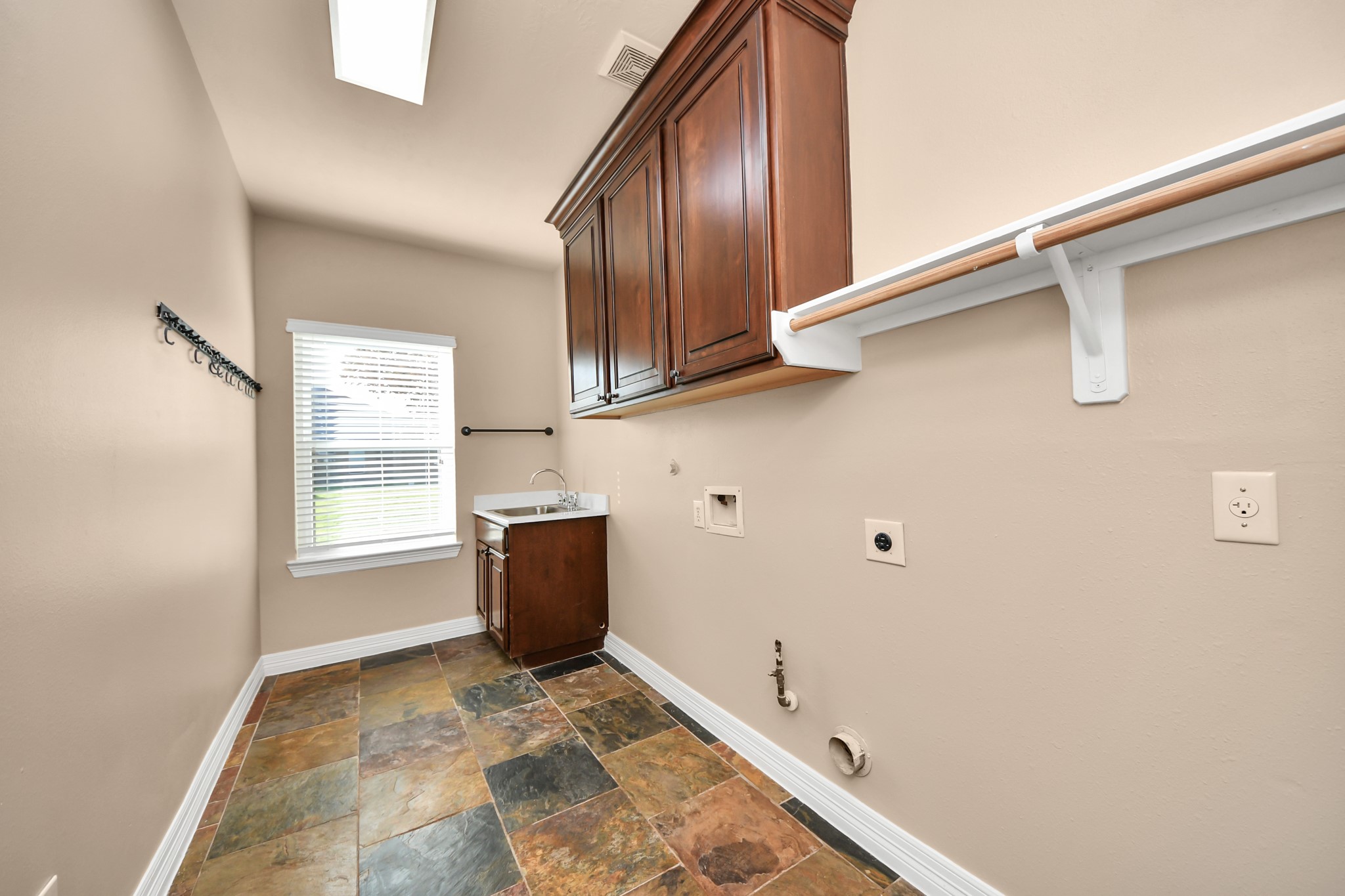 3511 River Bend Drive Rosenberg, TX 77471 - Photo 13 of 50 Bright, functional laundry room designed for everyday convenience