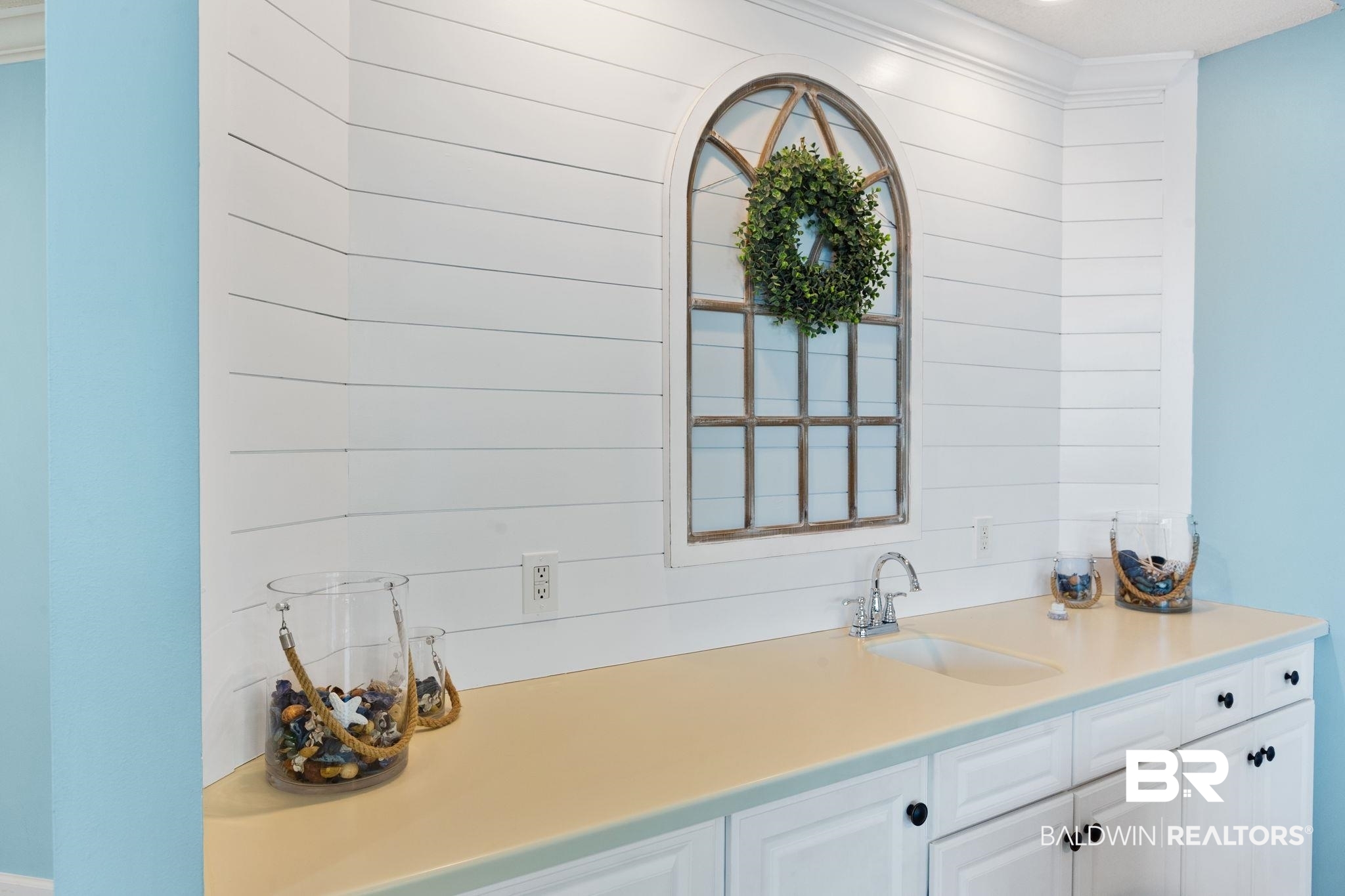 27580 Canal Road, Unit 1112 Orange Beach, AL 36561 - Photo 12 of 50 Bathroom with vanity and ornamental molding