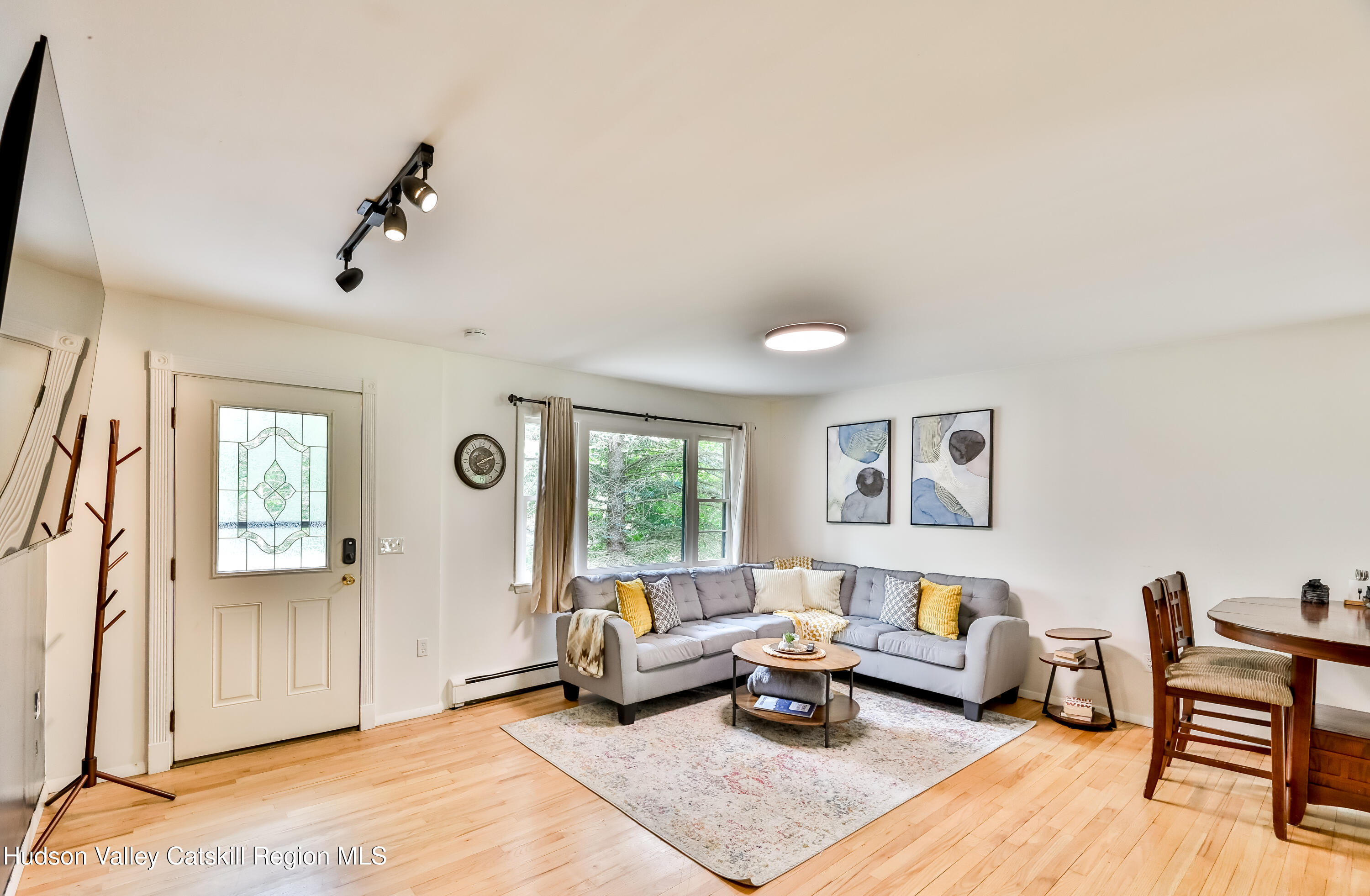 89 Maple Avenue Hunter, NY 12442 - Photo 14 of 41 a living room with furniture and a window