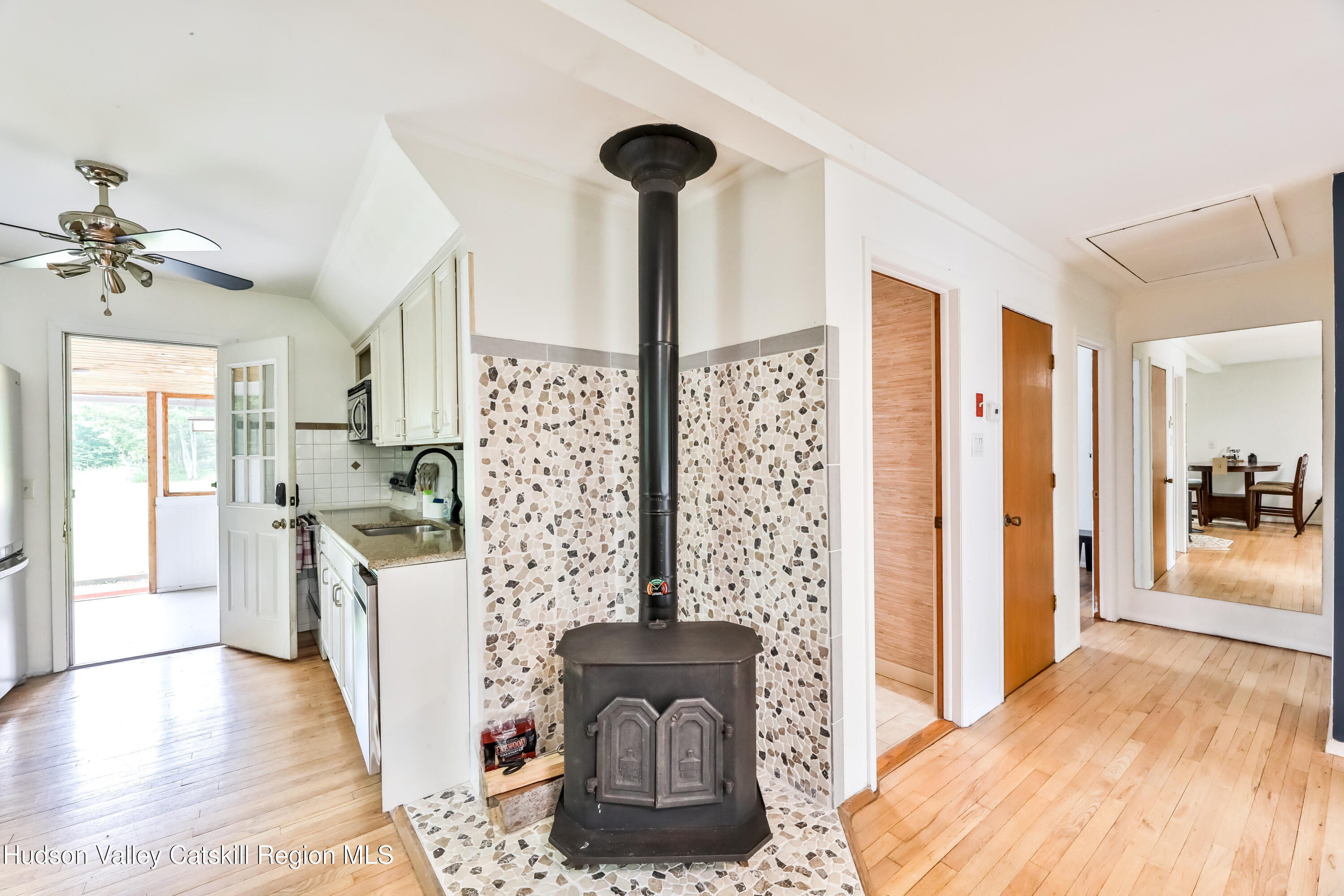 89 Maple Avenue Hunter, NY 12442 - Photo 15 of 41 a view of hall way with furniture and windows