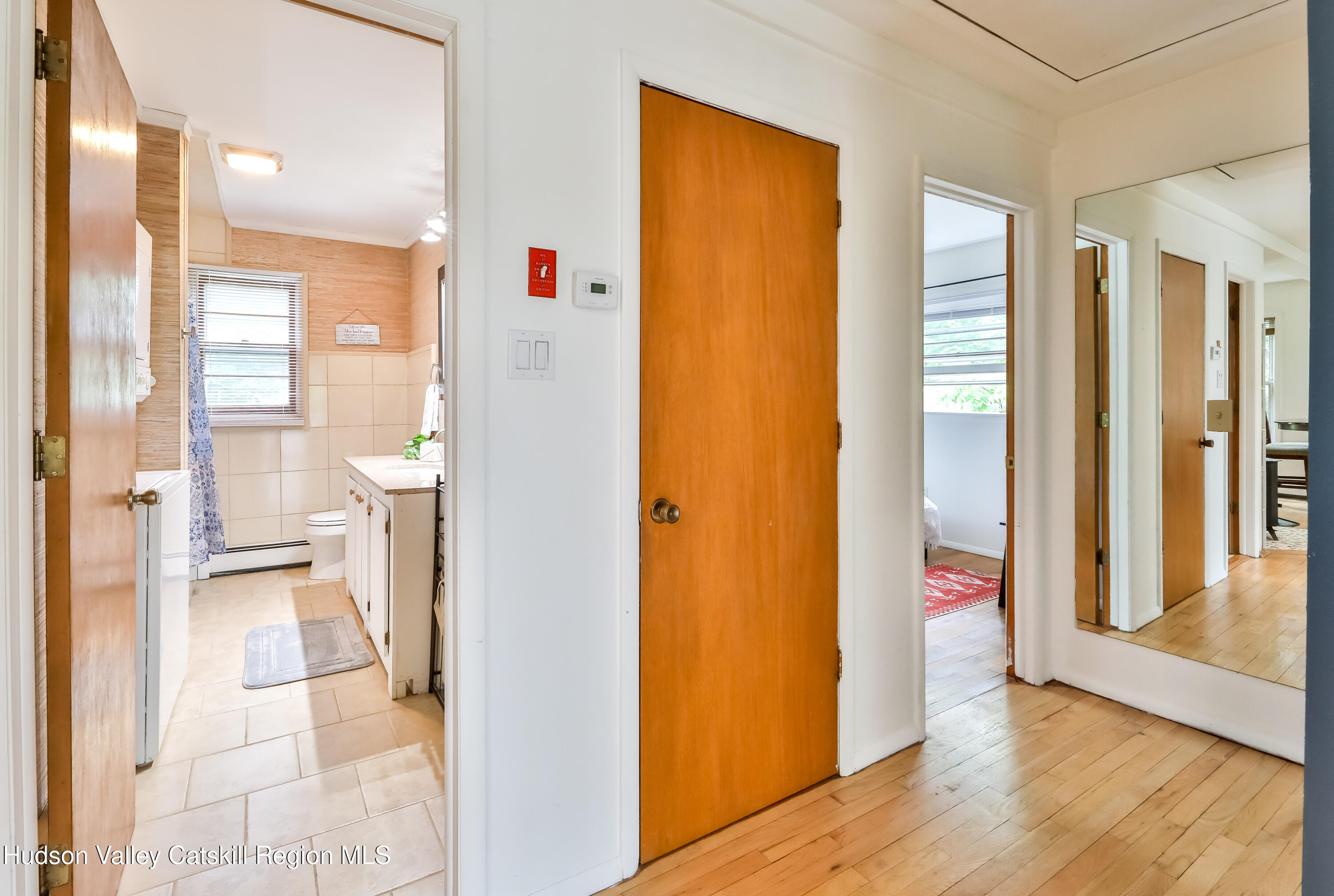 89 Maple Avenue Hunter, NY 12442 - Photo 18 of 41 a view of a bathroom with a tub and shower view