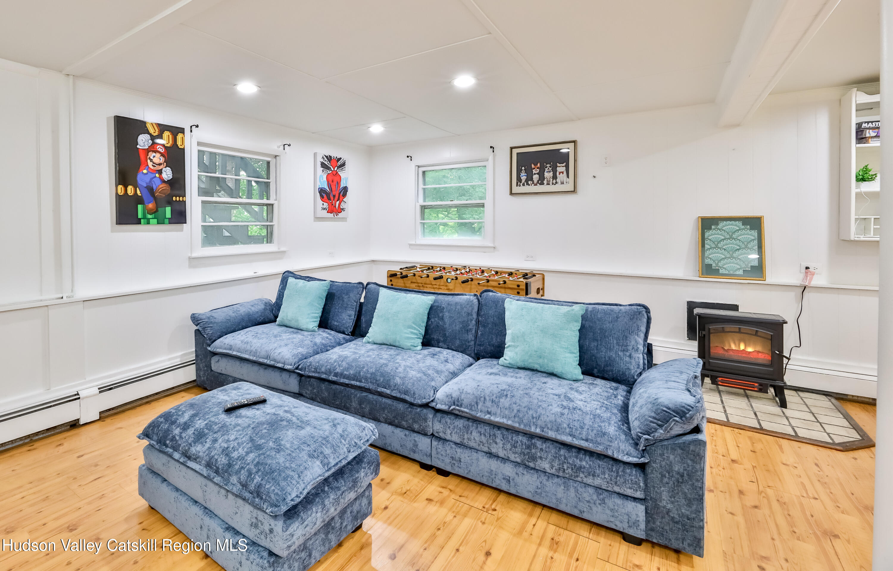 89 Maple Avenue Hunter, NY 12442 - Photo 27 of 41 a living room with furniture and a couch
