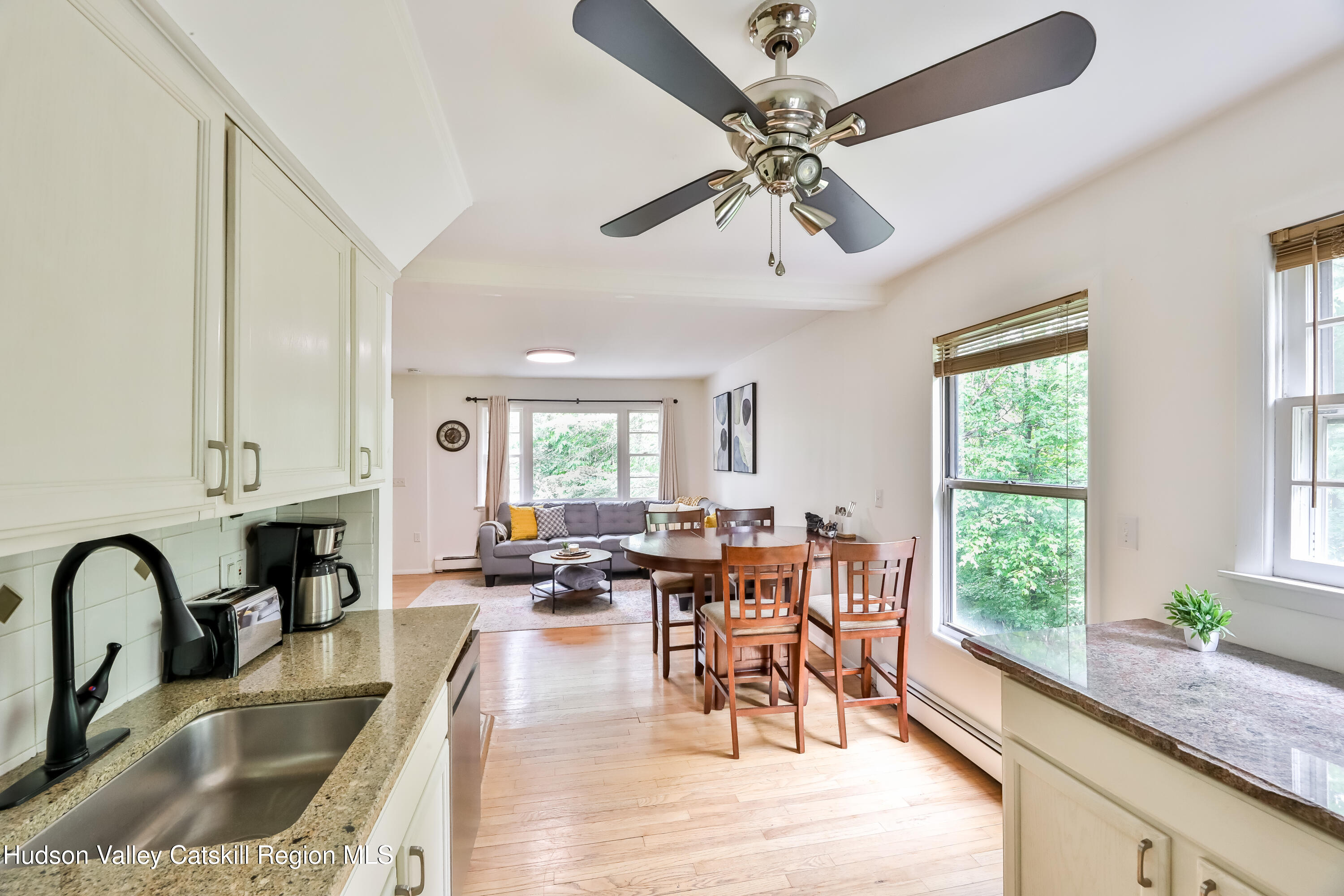 89 Maple Avenue Hunter, NY 12442 - Photo 9 of 41 a view of a dining room with furniture window and outside view