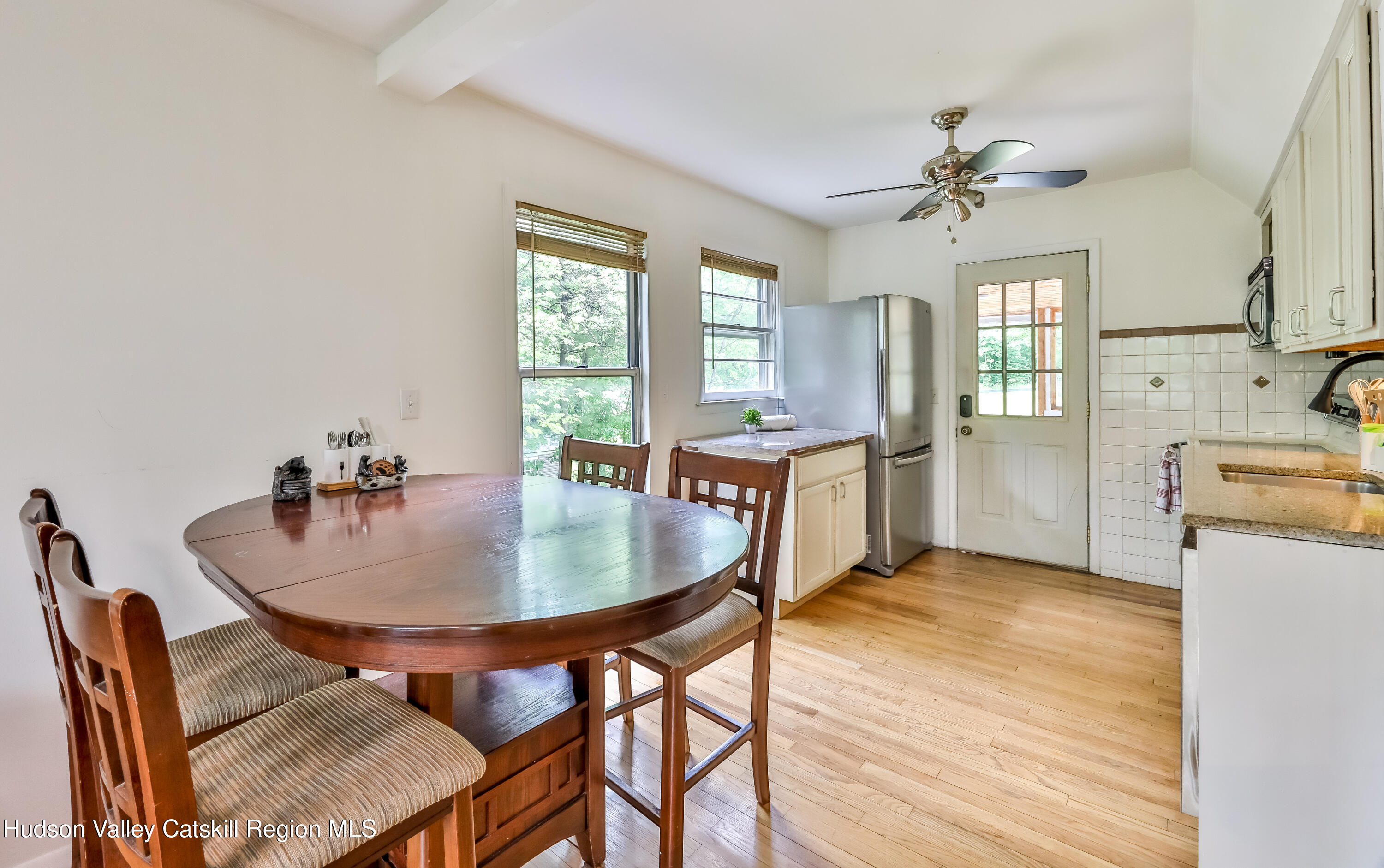 89 Maple Avenue Hunter, NY 12442 - Photo 10 of 41 a dining room with furniture and window