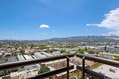 a view of a city skyline from a balcony