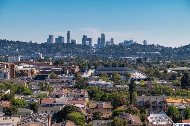 a view of a city with tall buildings