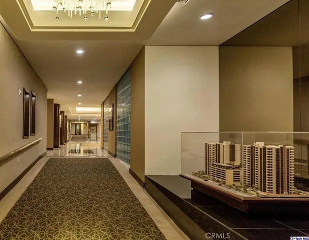 a view of a balcony with wooden floor