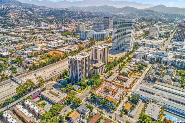 a city view with tall buildings