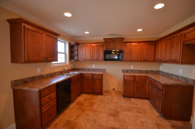 606 Legends View, Unit 55 Lebanon, TN 37090 - Photo 3 of 14 Kitchen With Lots Of Custom Cabinets And Tile Flooring