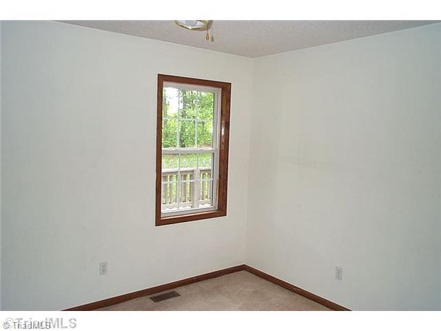 3450 Simerson Road Linwood, NC 27299 - Photo 11 of 14 1st Bedroom.