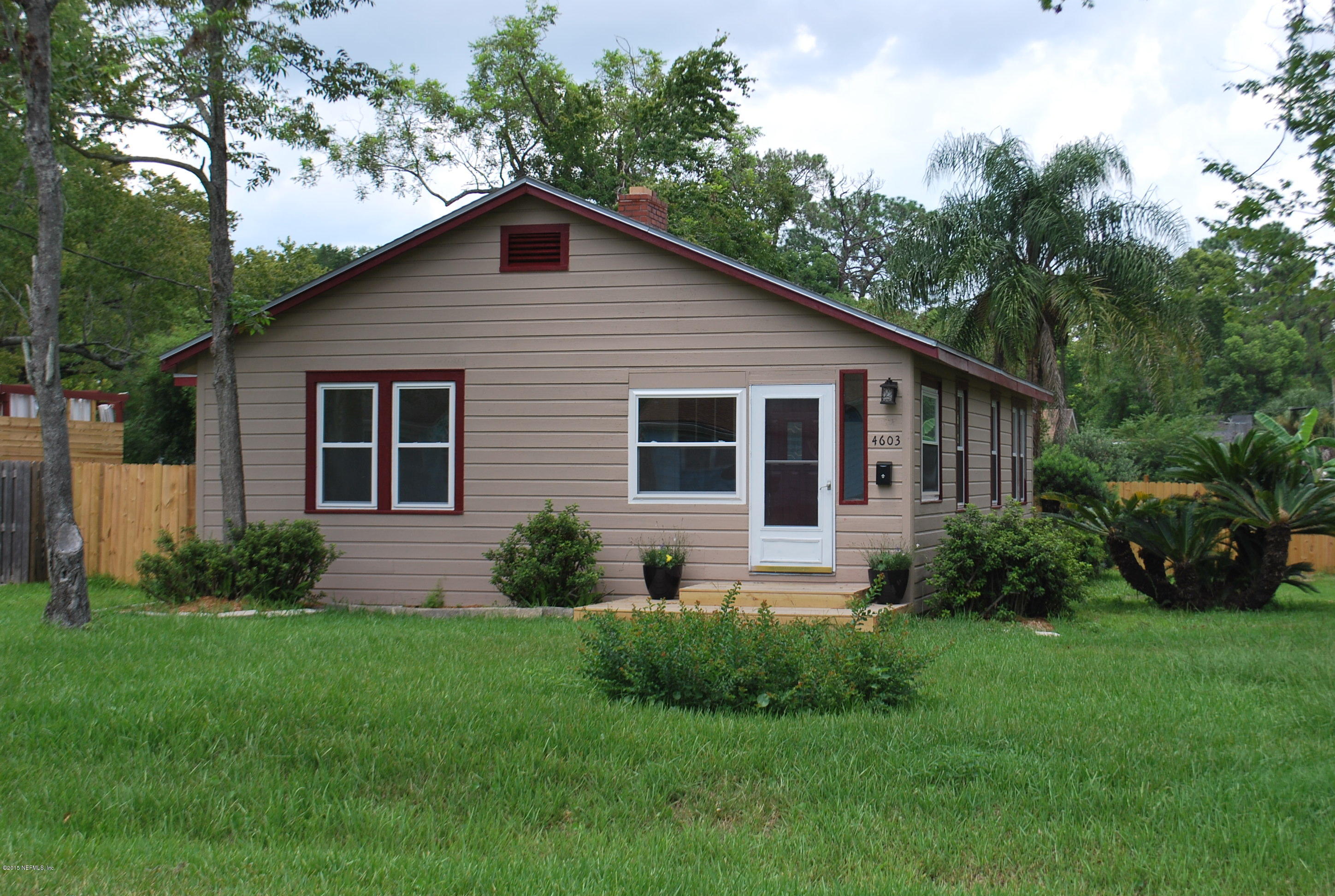4603 Sunderland Road Jacksonville, FL 32210 - Photo 3 of 20 a front view of house with yard and green space