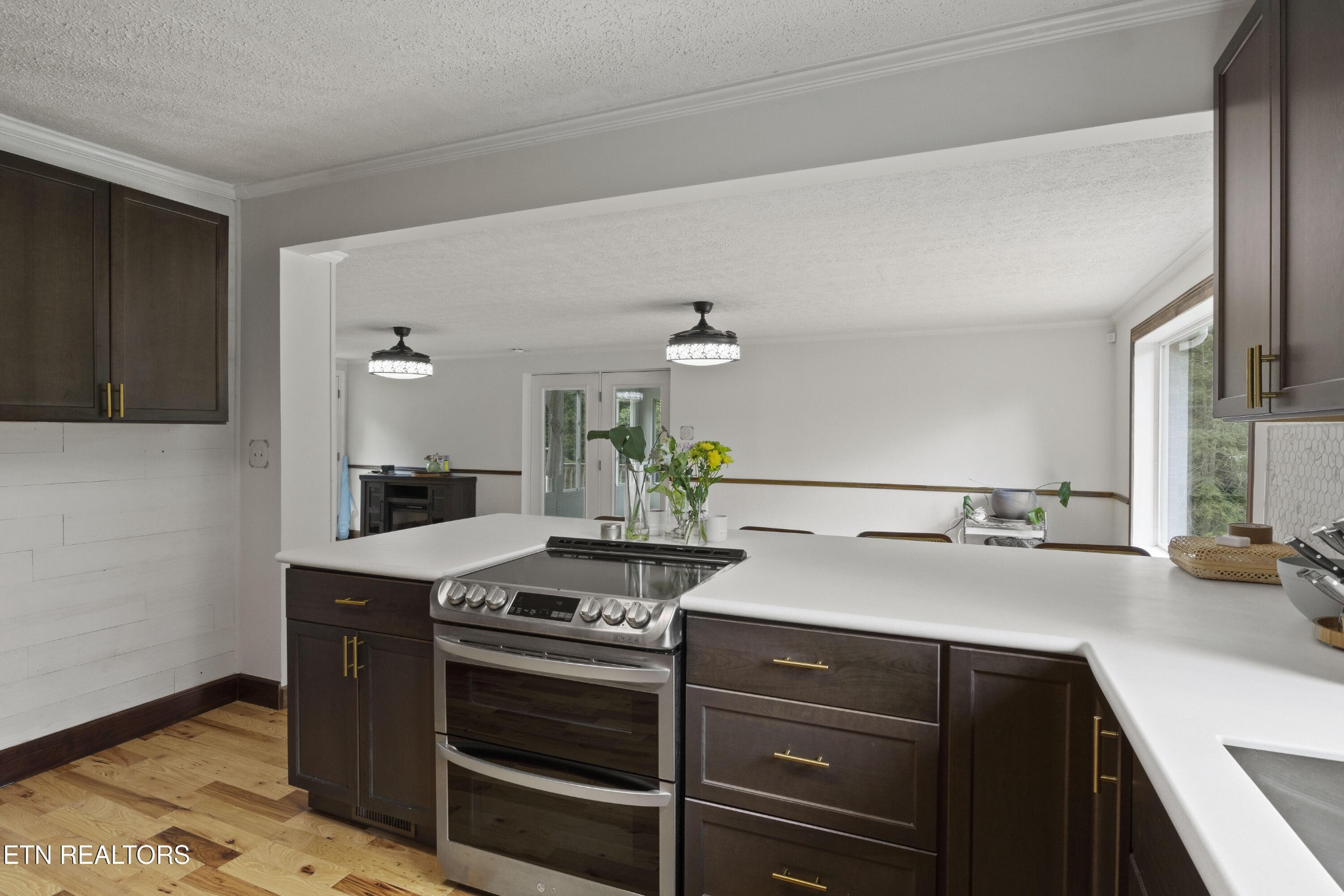 99 Reservoir Road Norris, TN 37828 - Photo 11 of 47 a kitchen with a stove and a sink