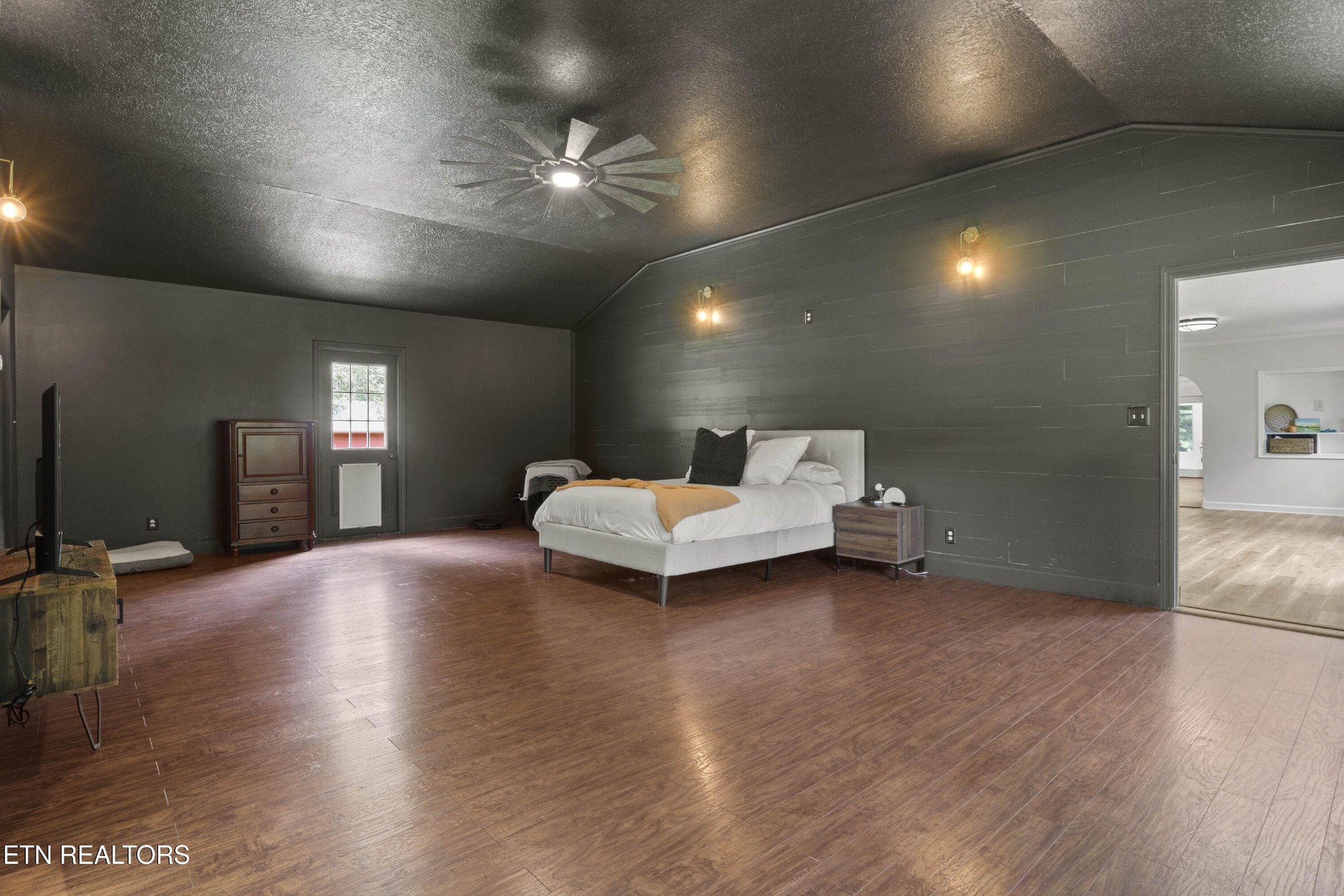 99 Reservoir Road Norris, TN 37828 - Photo 16 of 47 a living room with furniture and a flat screen tv