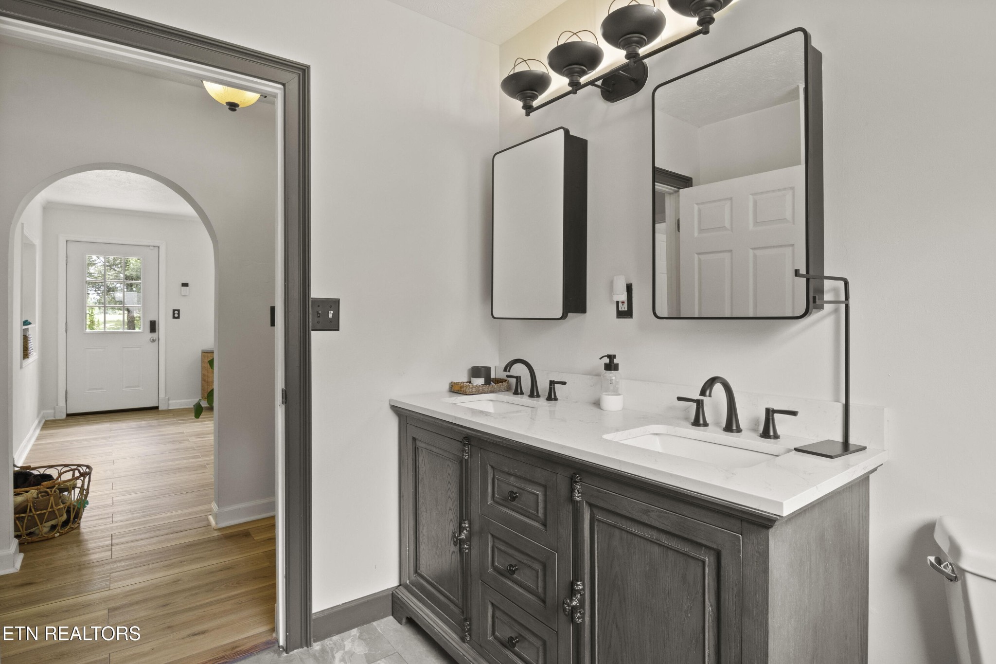 99 Reservoir Road Norris, TN 37828 - Photo 26 of 47 a bathroom with a sink and a mirror