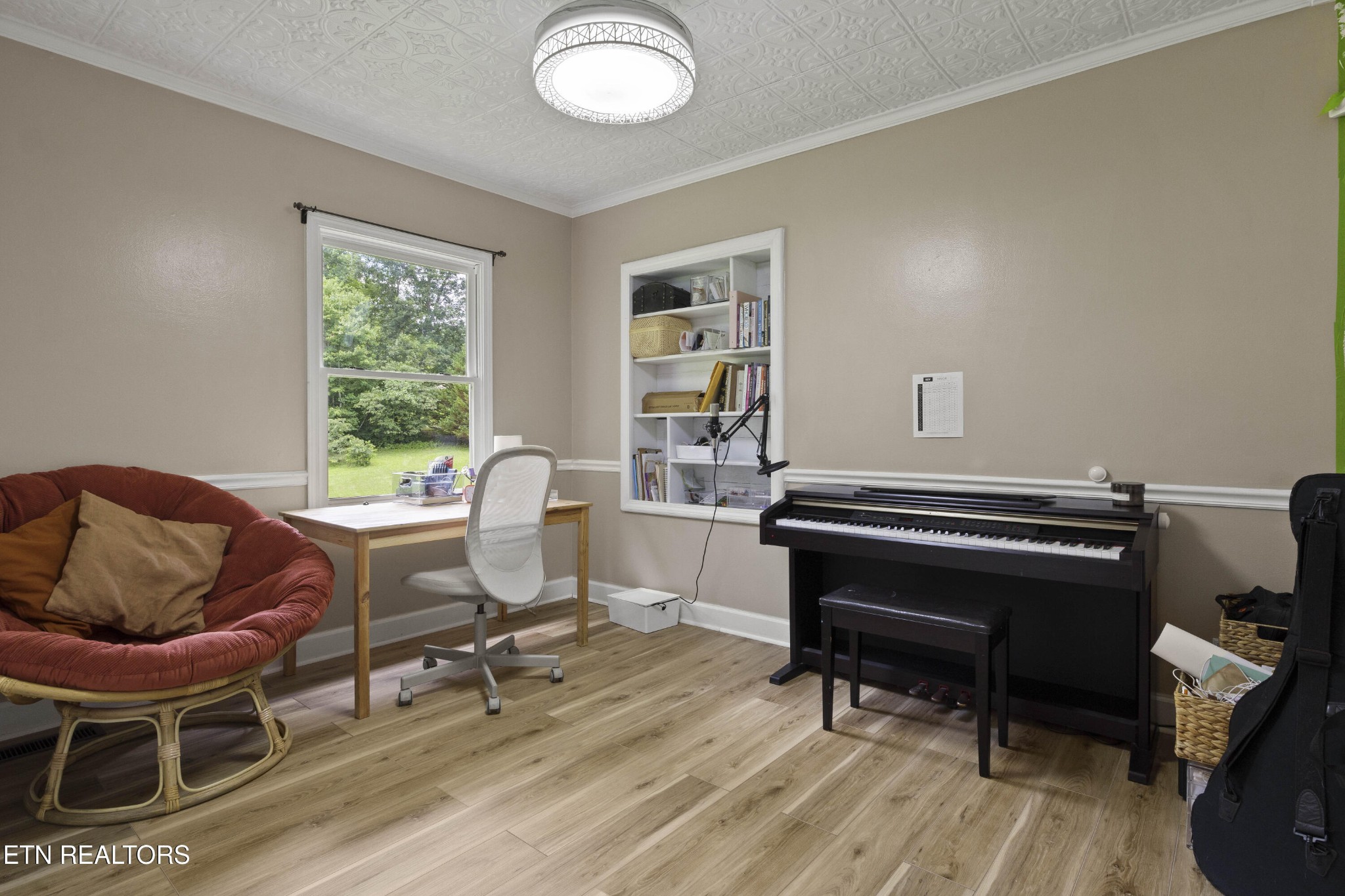 99 Reservoir Road Norris, TN 37828 - Photo 29 of 47 a work room with furniture and a window