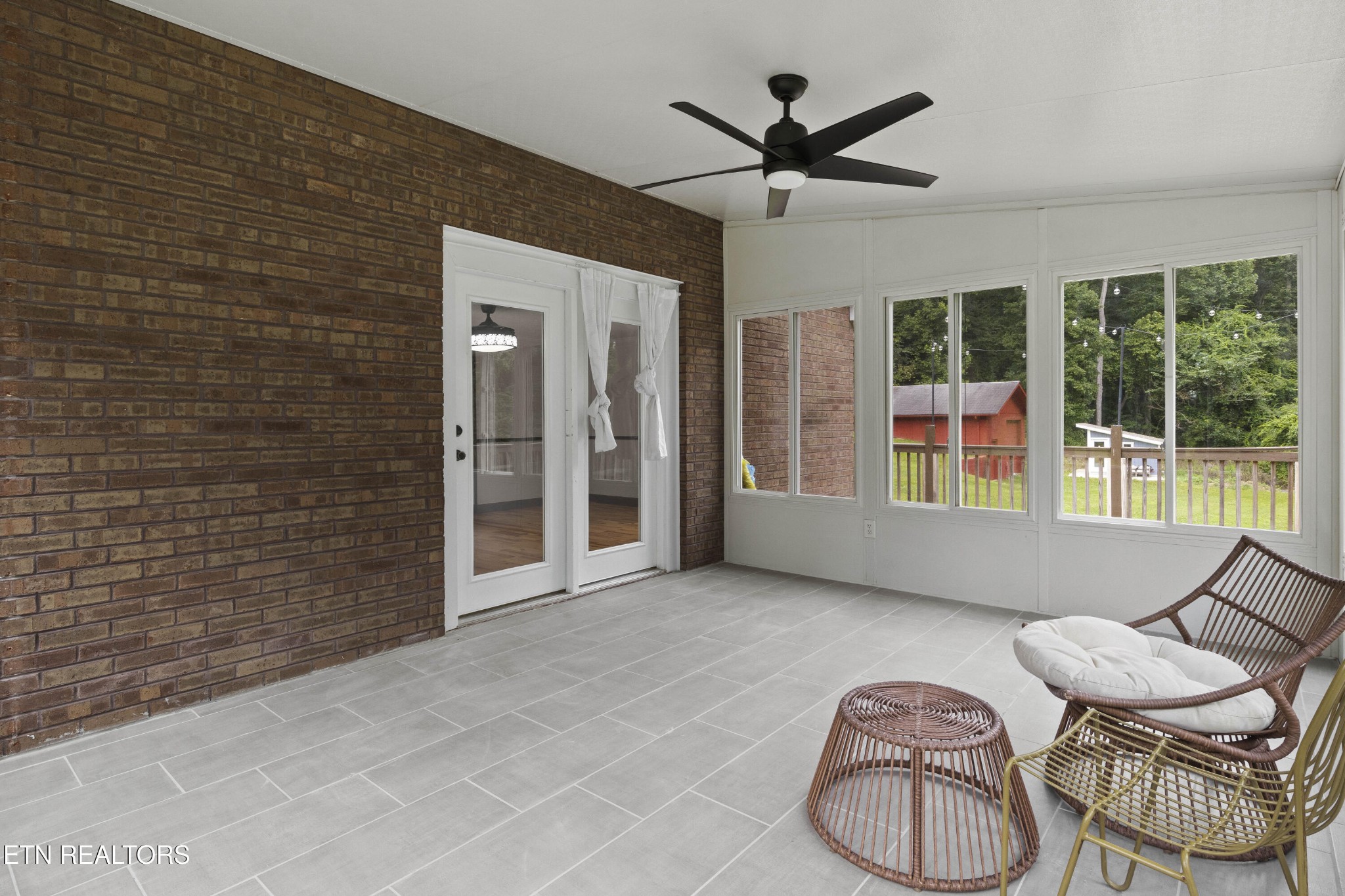 99 Reservoir Road Norris, TN 37828 - Photo 32 of 47 a living room with furniture and a window