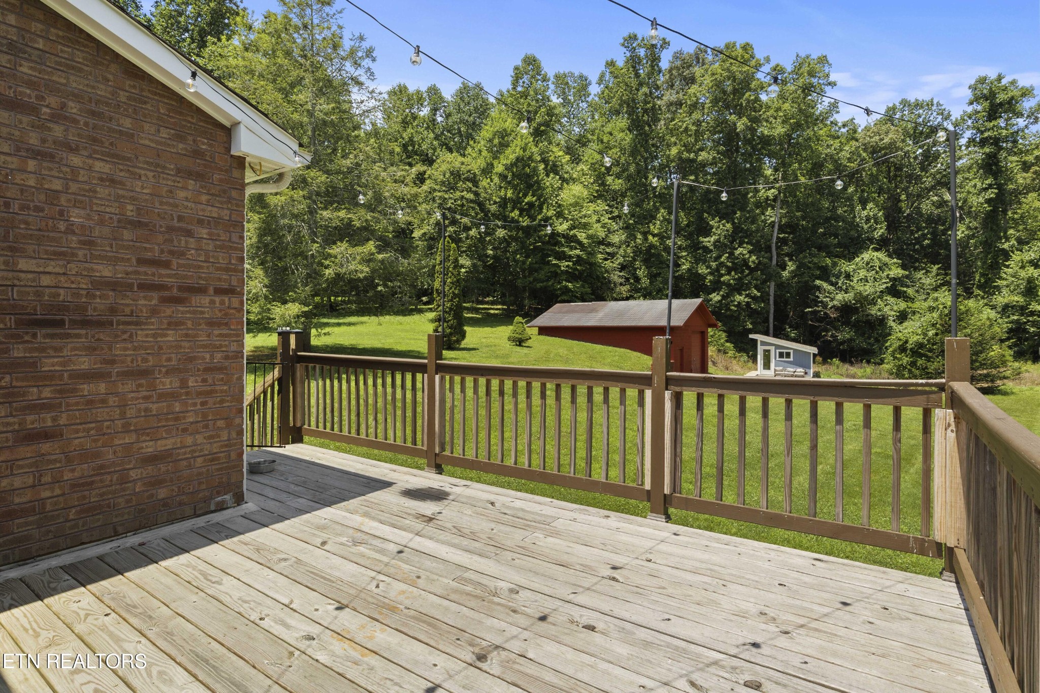 99 Reservoir Road Norris, TN 37828 - Photo 35 of 47 a view of a balcony with wooden floor