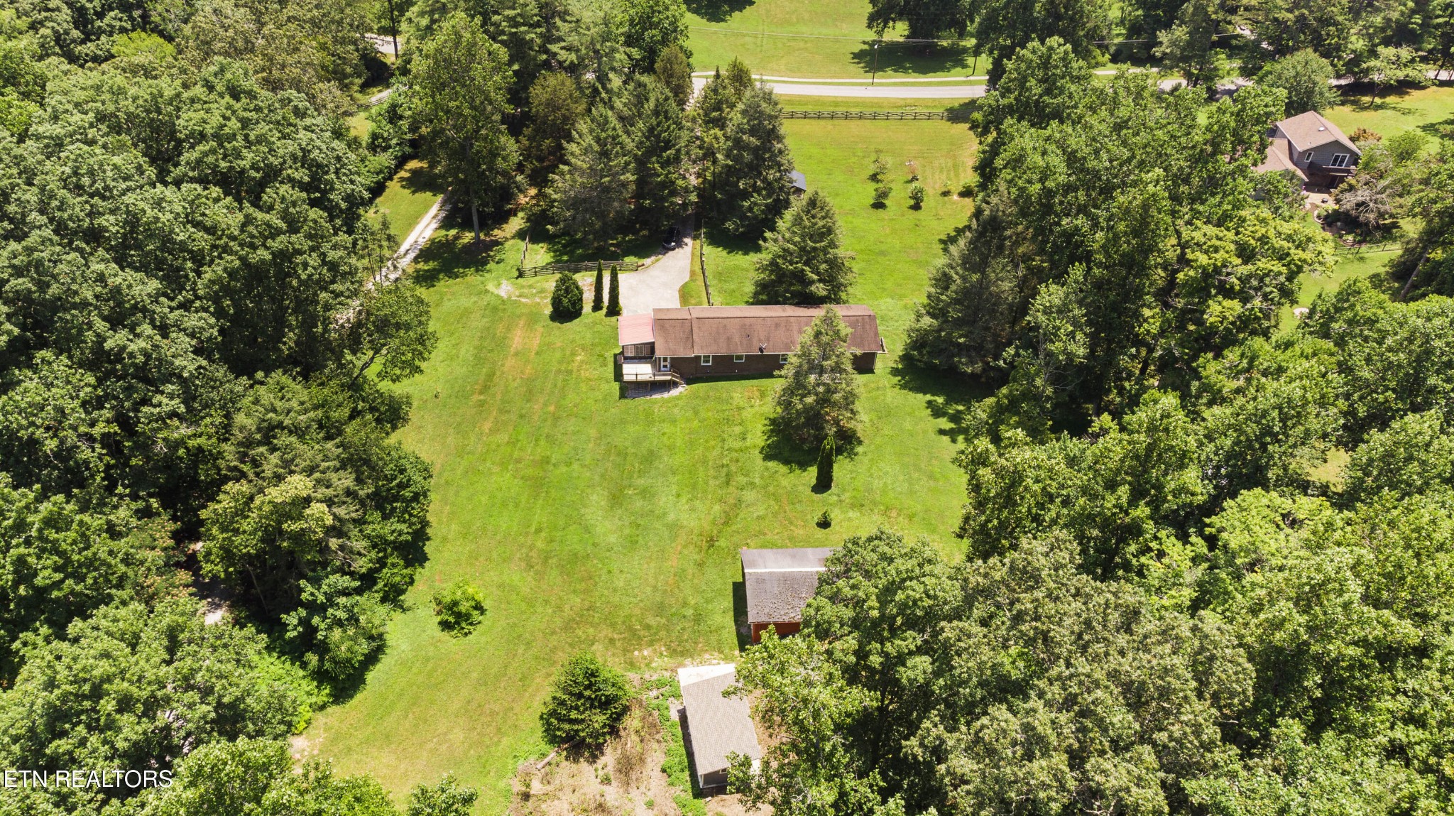 99 Reservoir Road Norris, TN 37828 - Photo 43 of 47 an aerial view of a house with a yard