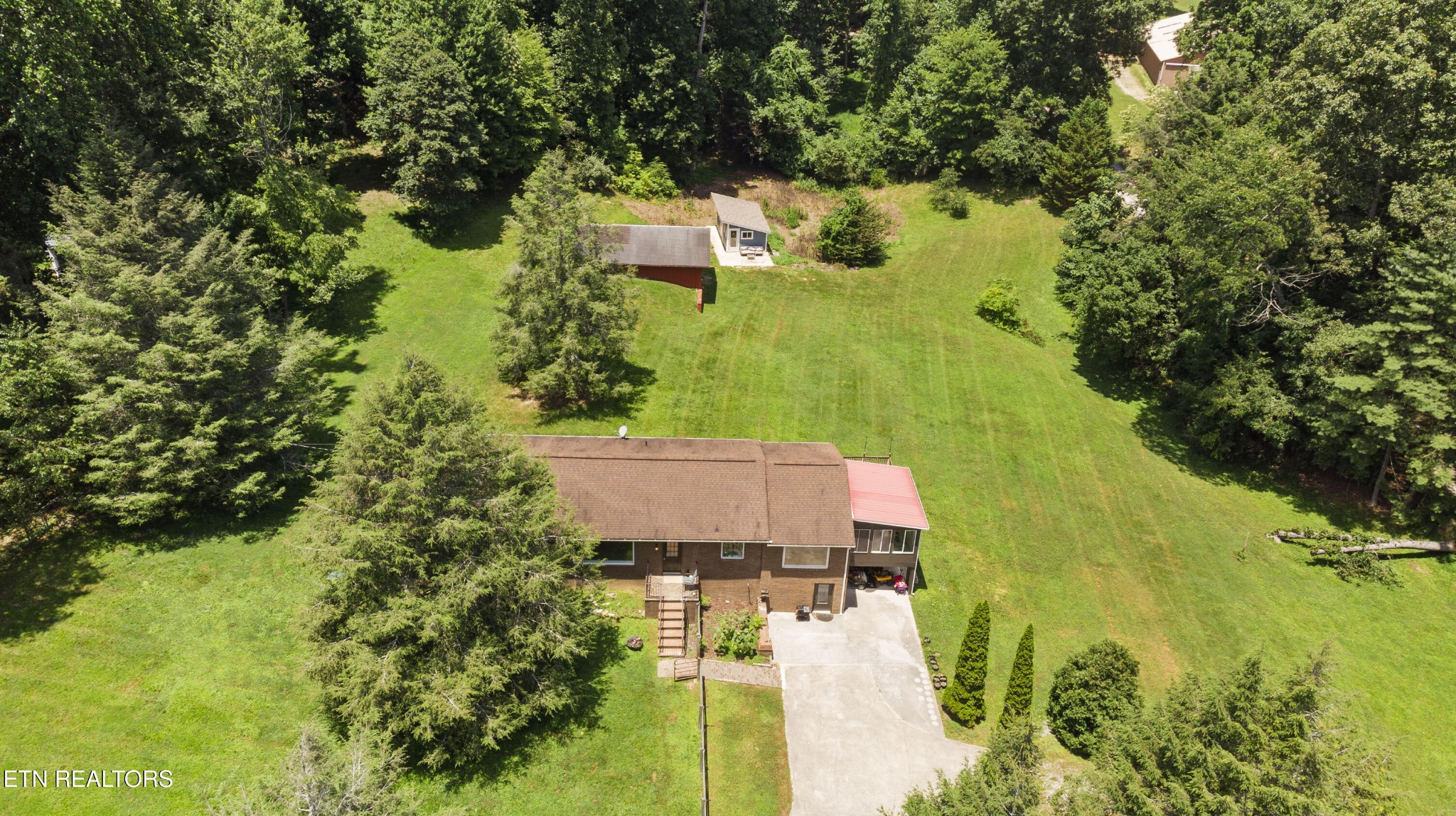 99 Reservoir Road Norris, TN 37828 - Photo 45 of 47 an aerial view of residential houses with outdoor space and trees