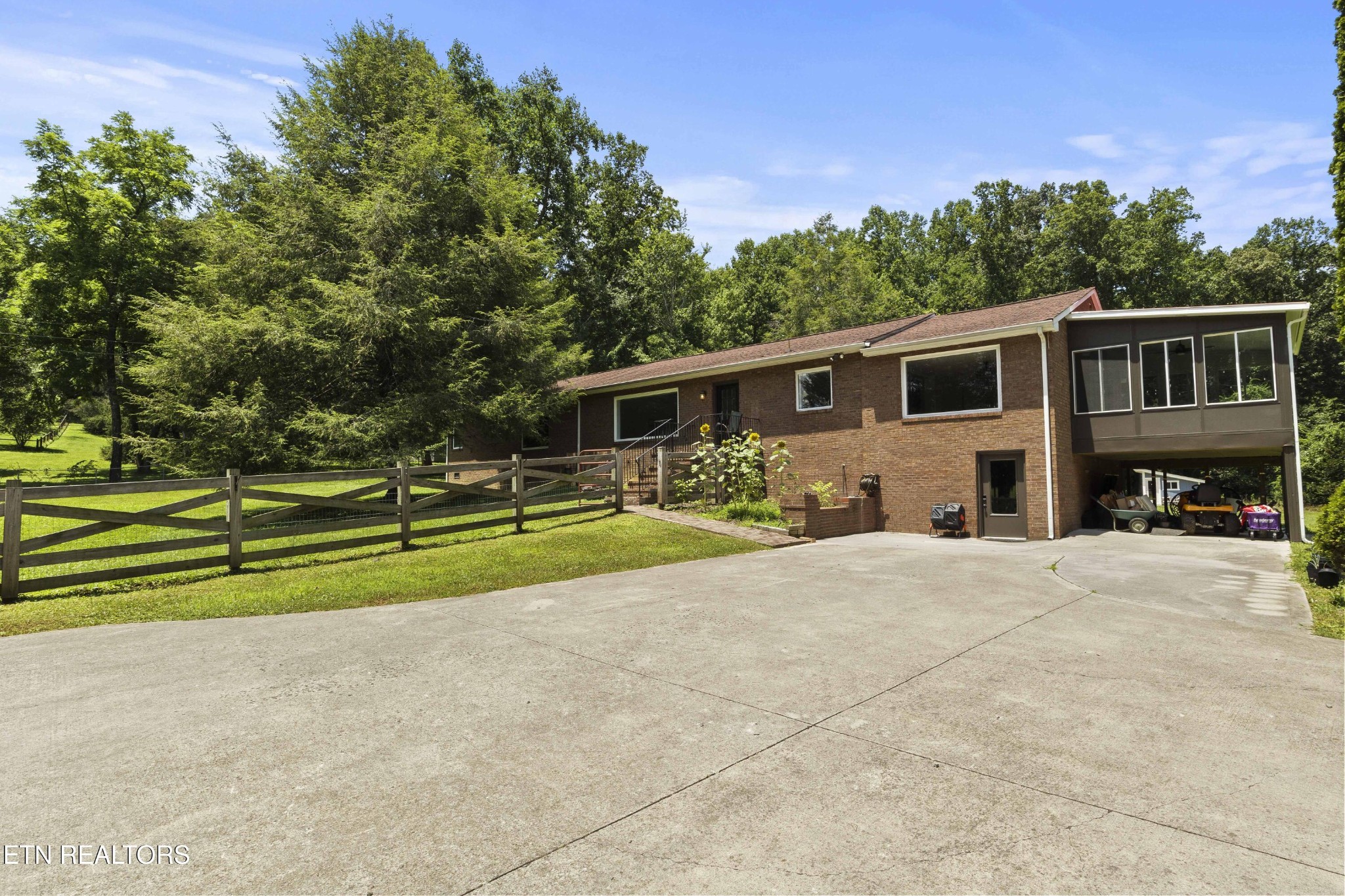 99 Reservoir Road Norris, TN 37828 - Photo 46 of 47 a front view of house with yard and green space