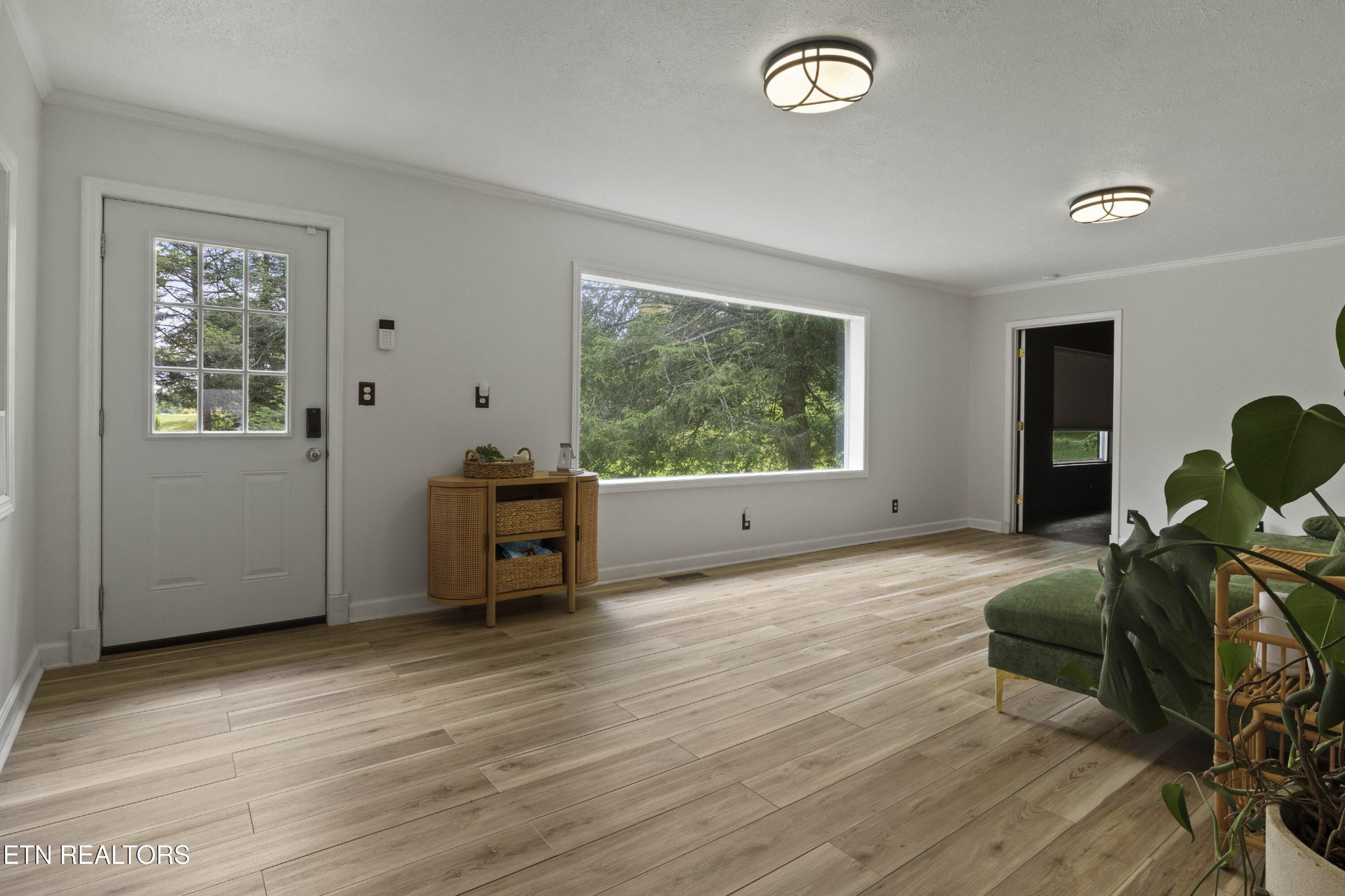 99 Reservoir Road Norris, TN 37828 - Photo 7 of 47 a living room with furniture and a window