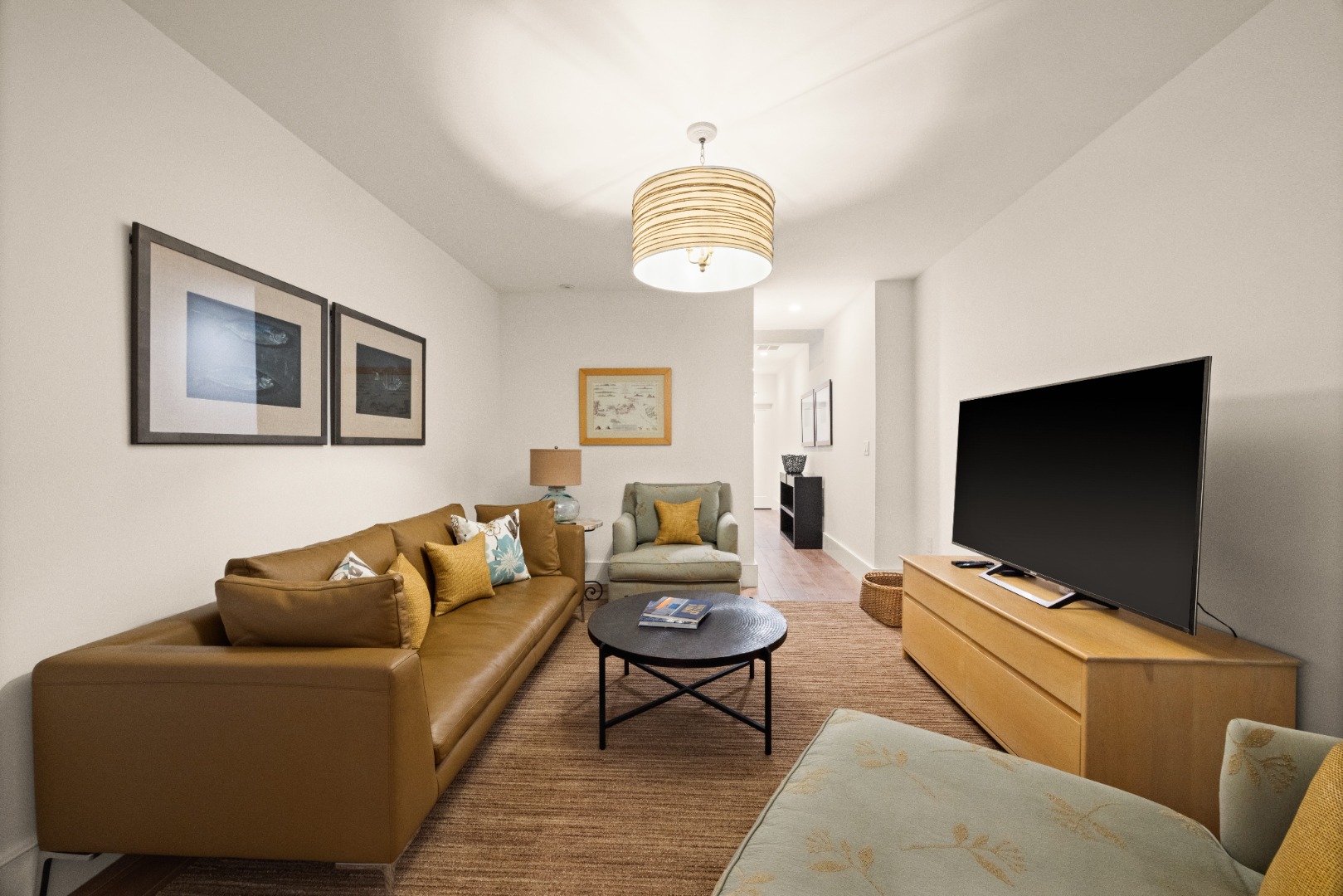 10 Tilton Way Edgartown, MA 02539 - Photo 24 of 37 a living room with furniture and a flat screen tv