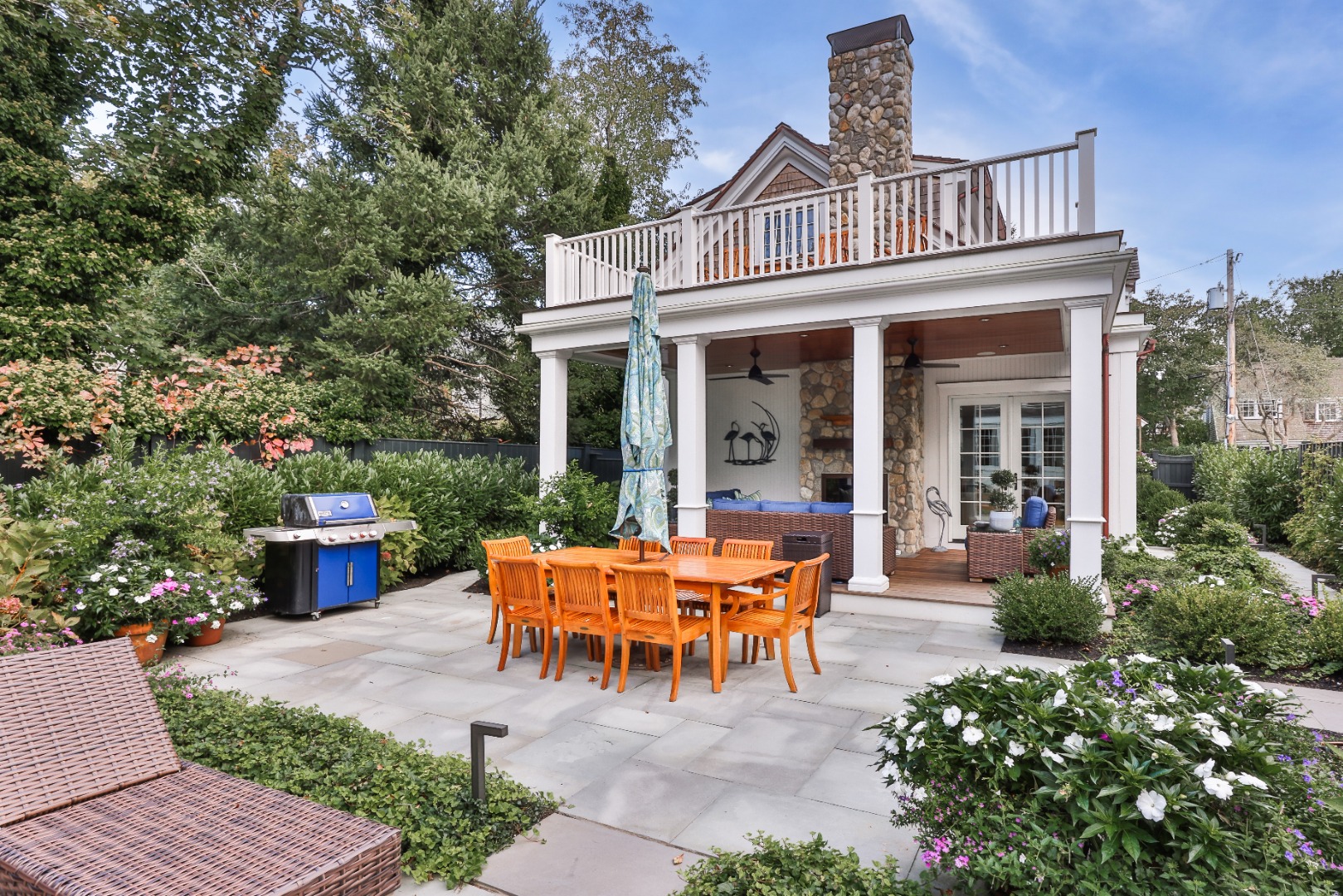 10 Tilton Way Edgartown, MA 02539 - Photo 37 of 37 a view of a house with patio and a garden