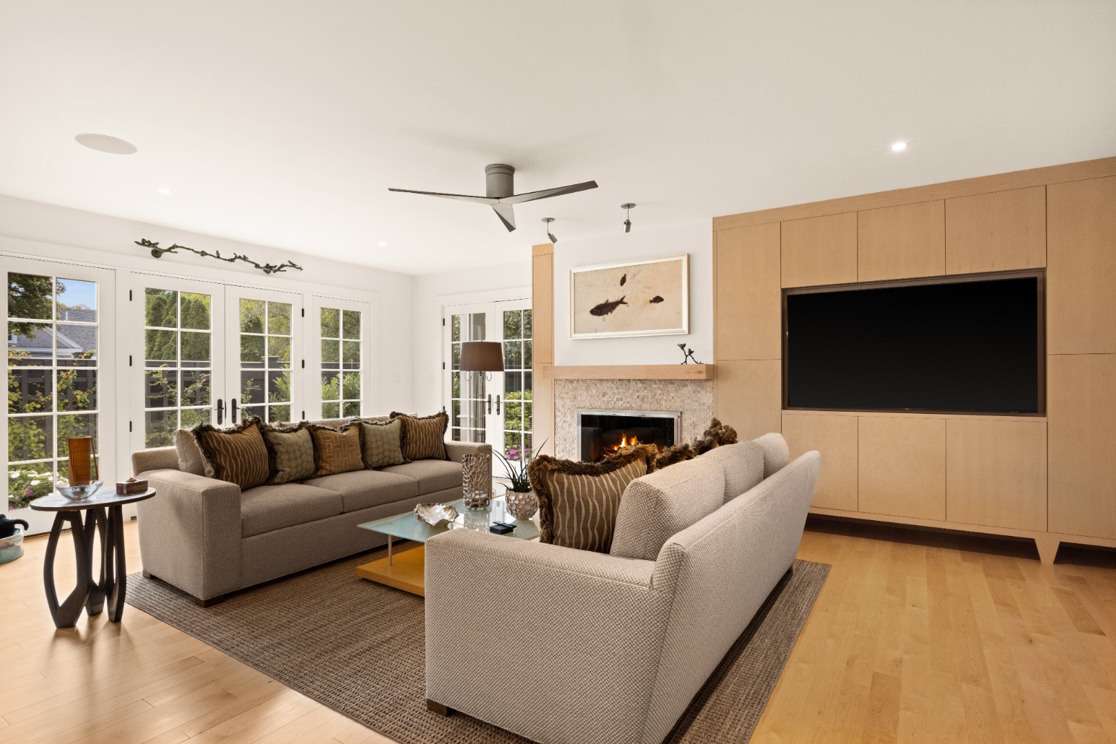 10 Tilton Way Edgartown, MA 02539 - Photo 8 of 37 a living room with furniture a fireplace and a flat screen tv